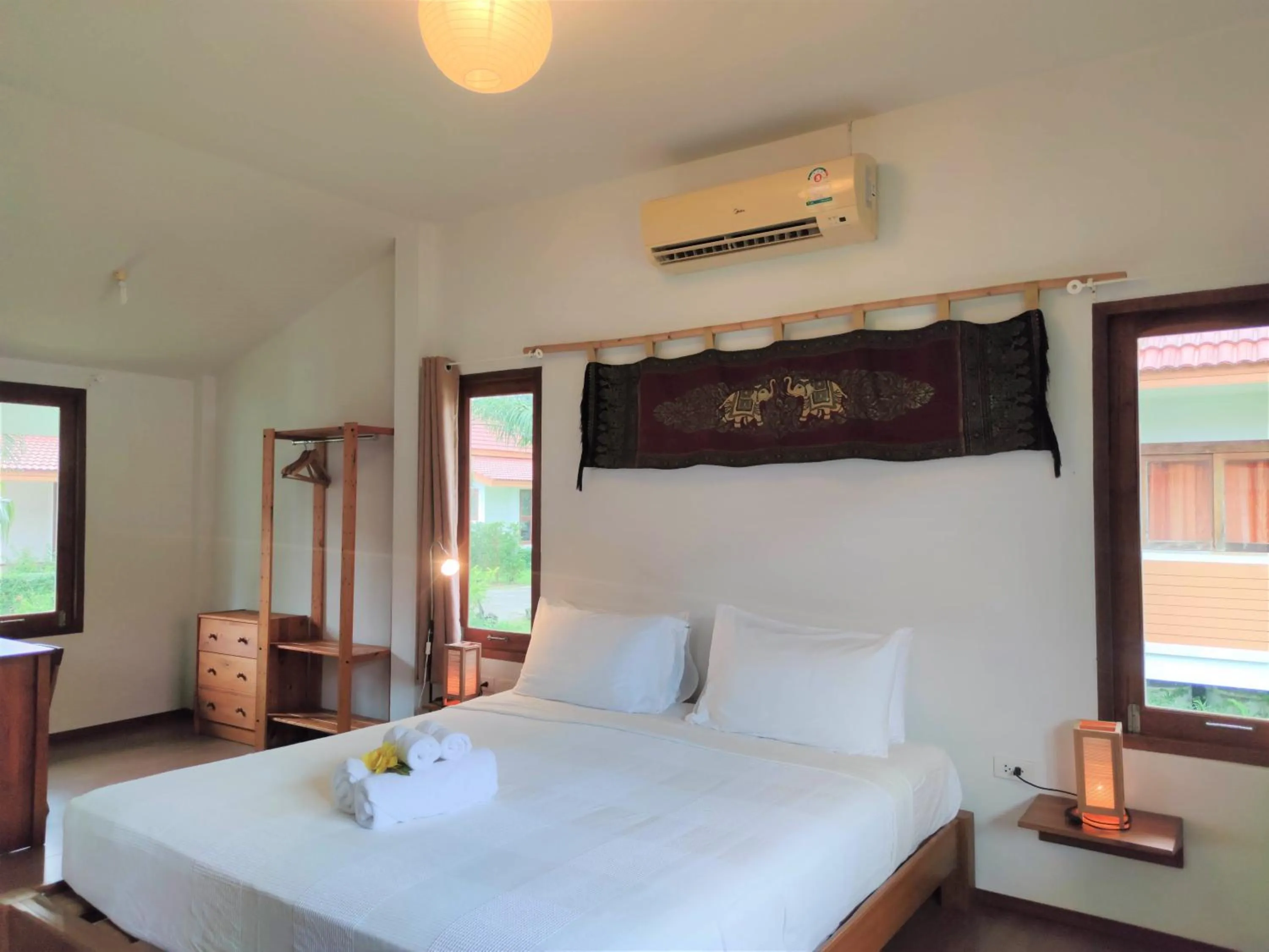 Bed in Armonia Village Resort and Spa