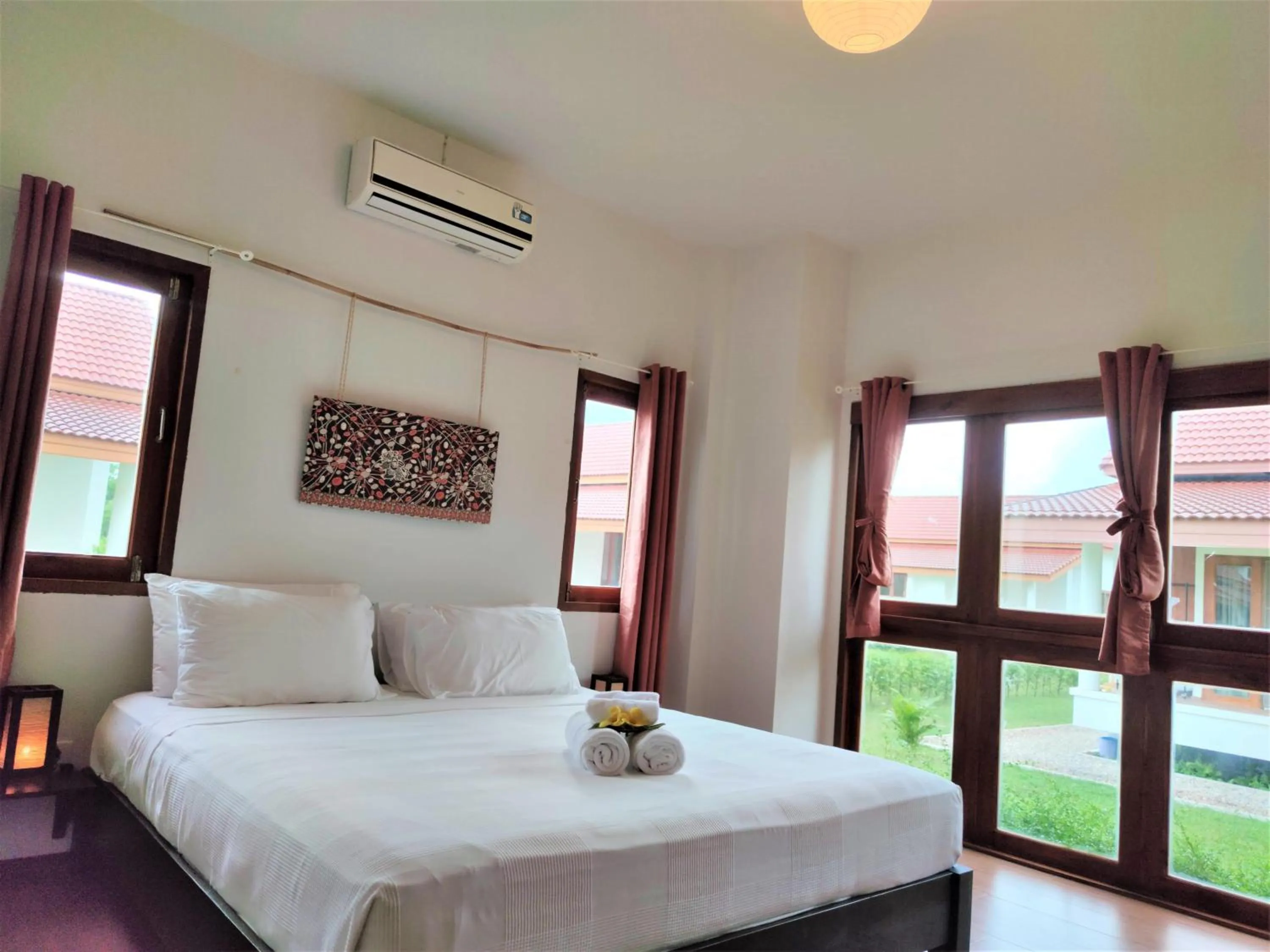 Bed in Armonia Village Resort and Spa