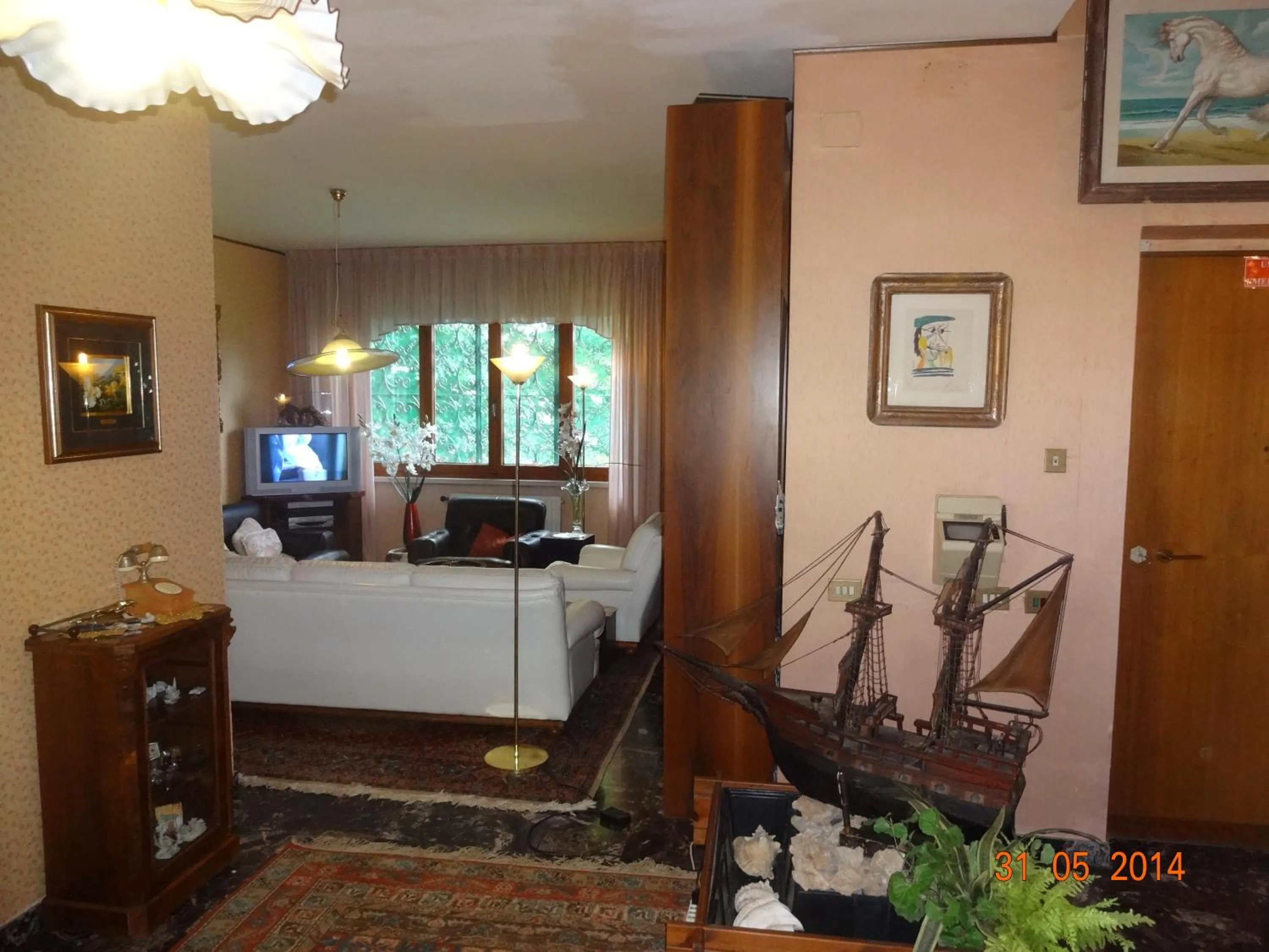 Communal lounge/ TV room in B&B Villa Sans Souci