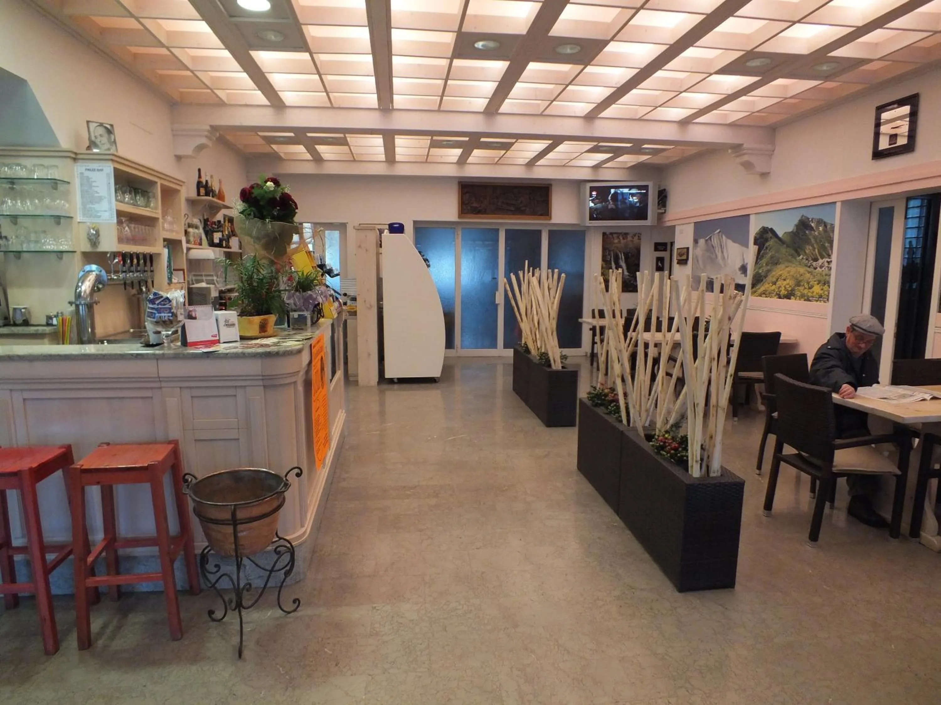 Communal lounge/ TV room in Piccolo Hotel