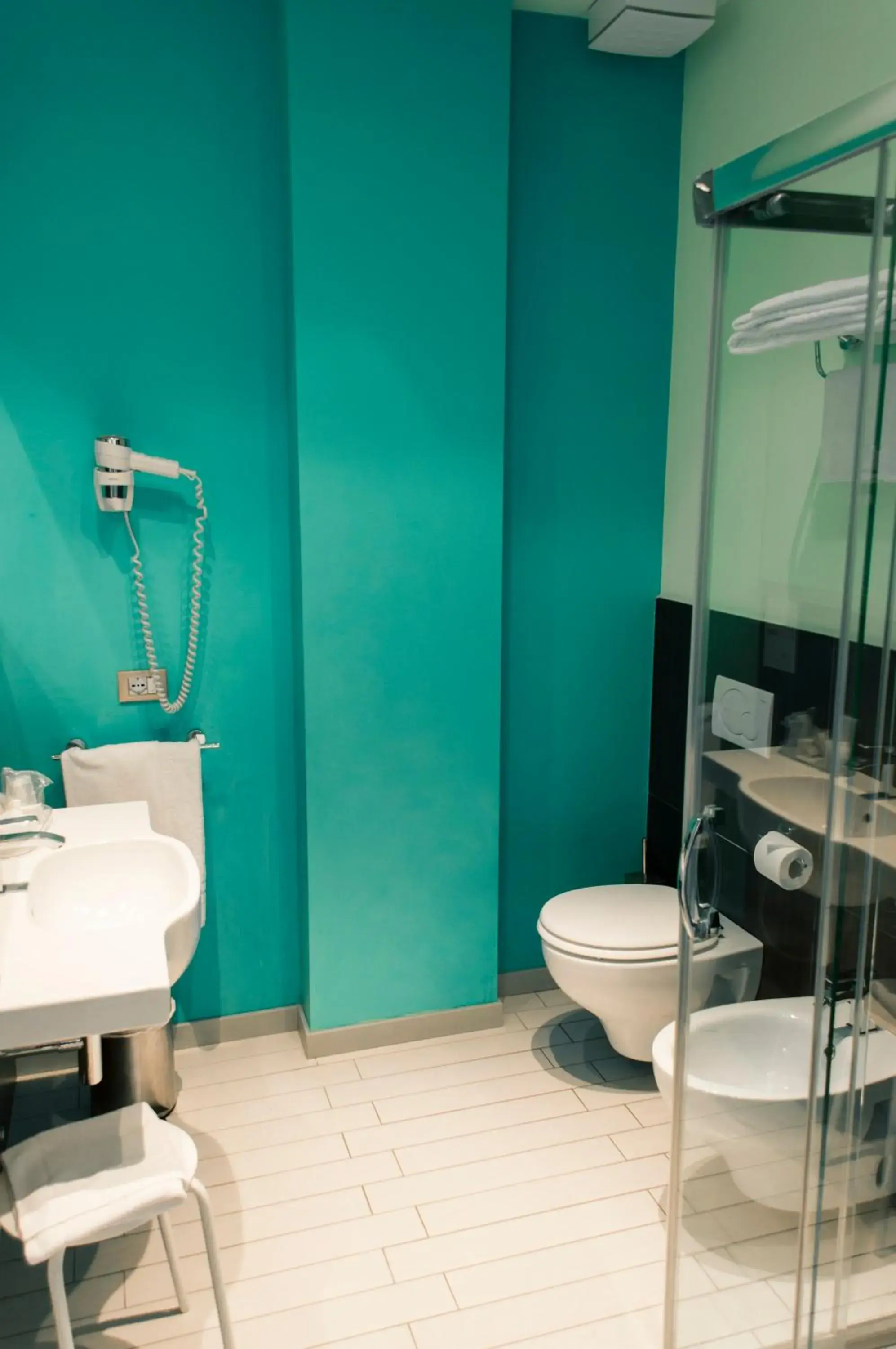 Bathroom in Hotel & Residence Cavalluccio Marino