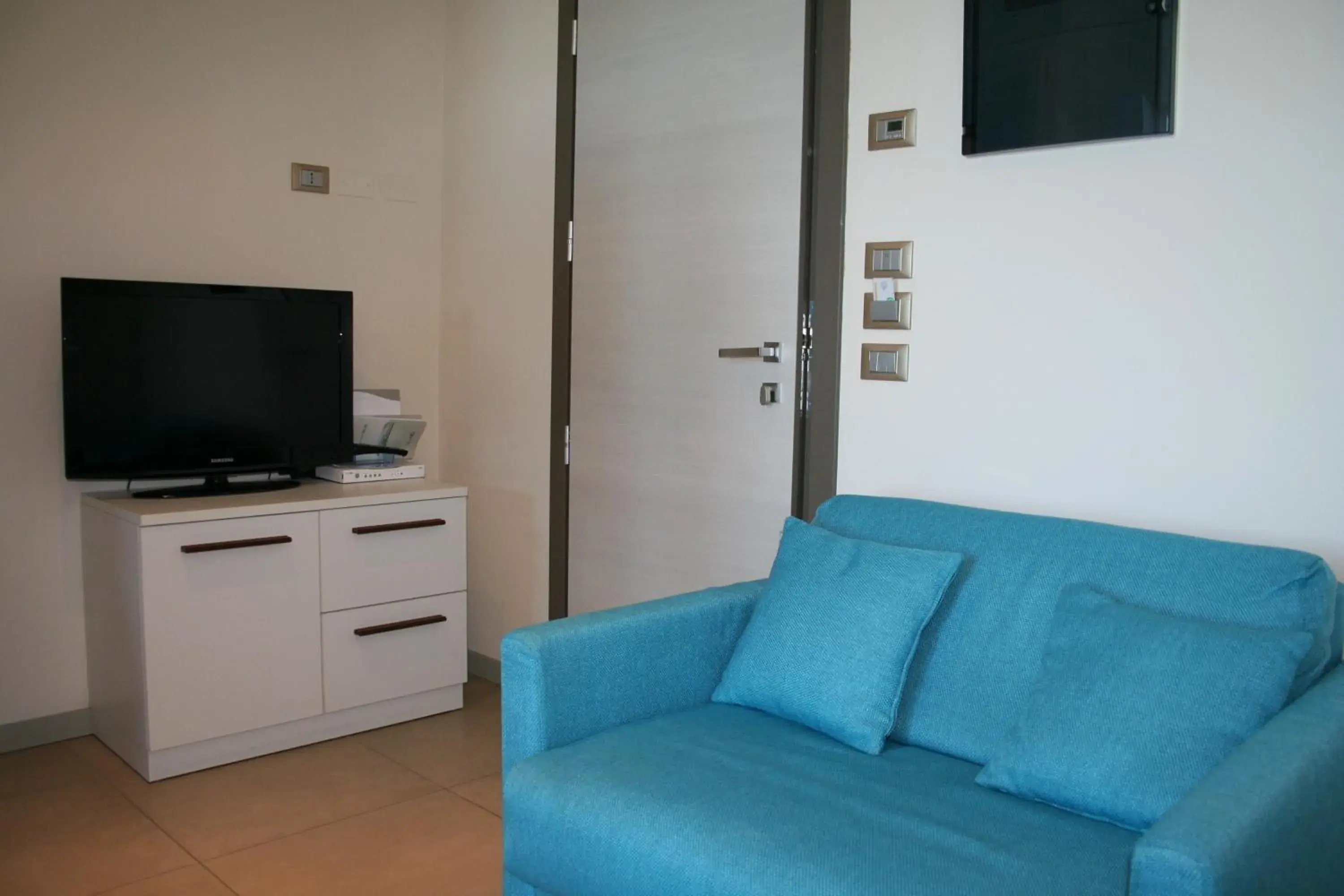 Living room, TV/Entertainment Center in Hotel & Residence Cavalluccio Marino