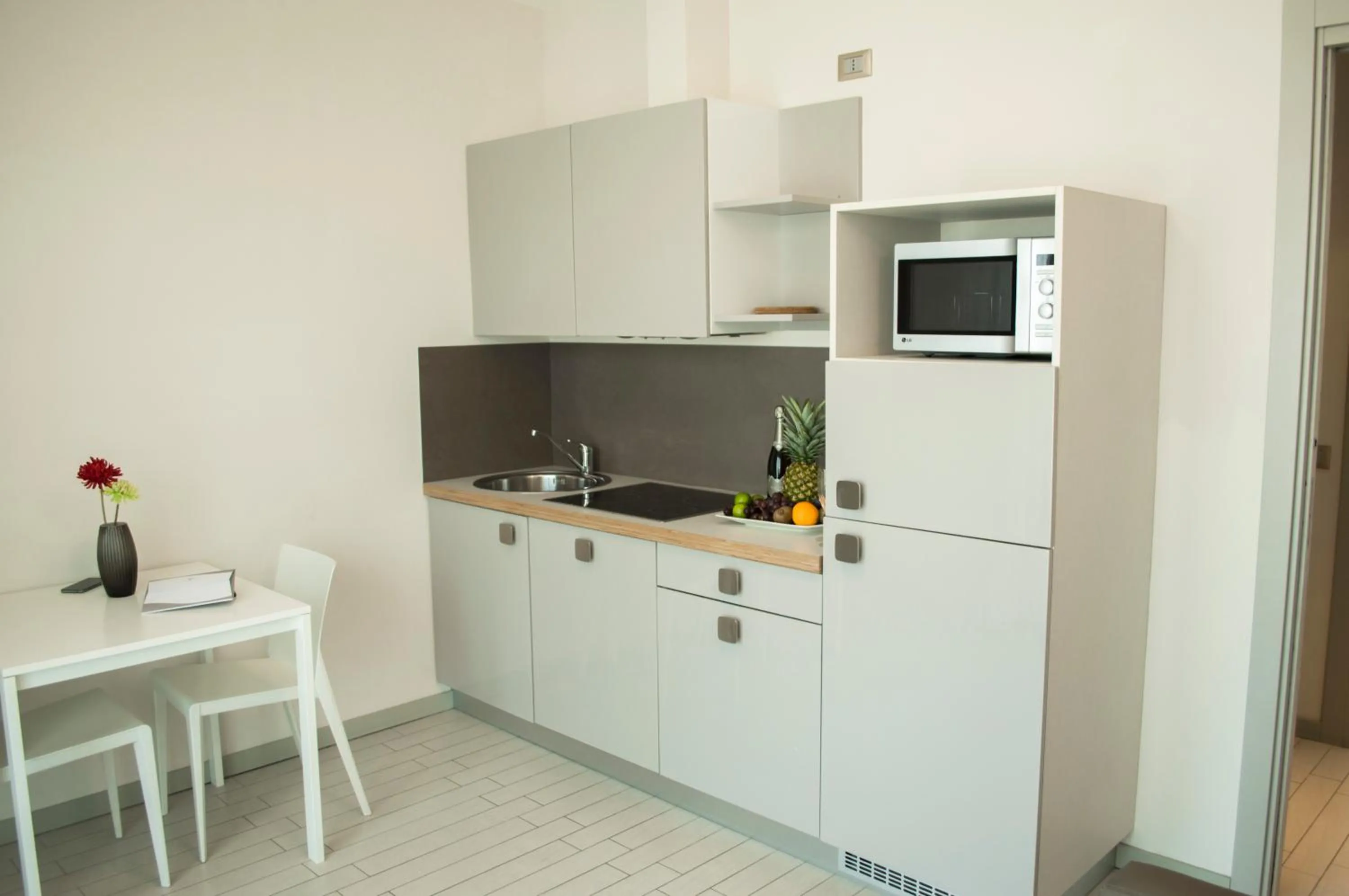Kitchen or kitchenette in Hotel & Residence Cavalluccio Marino