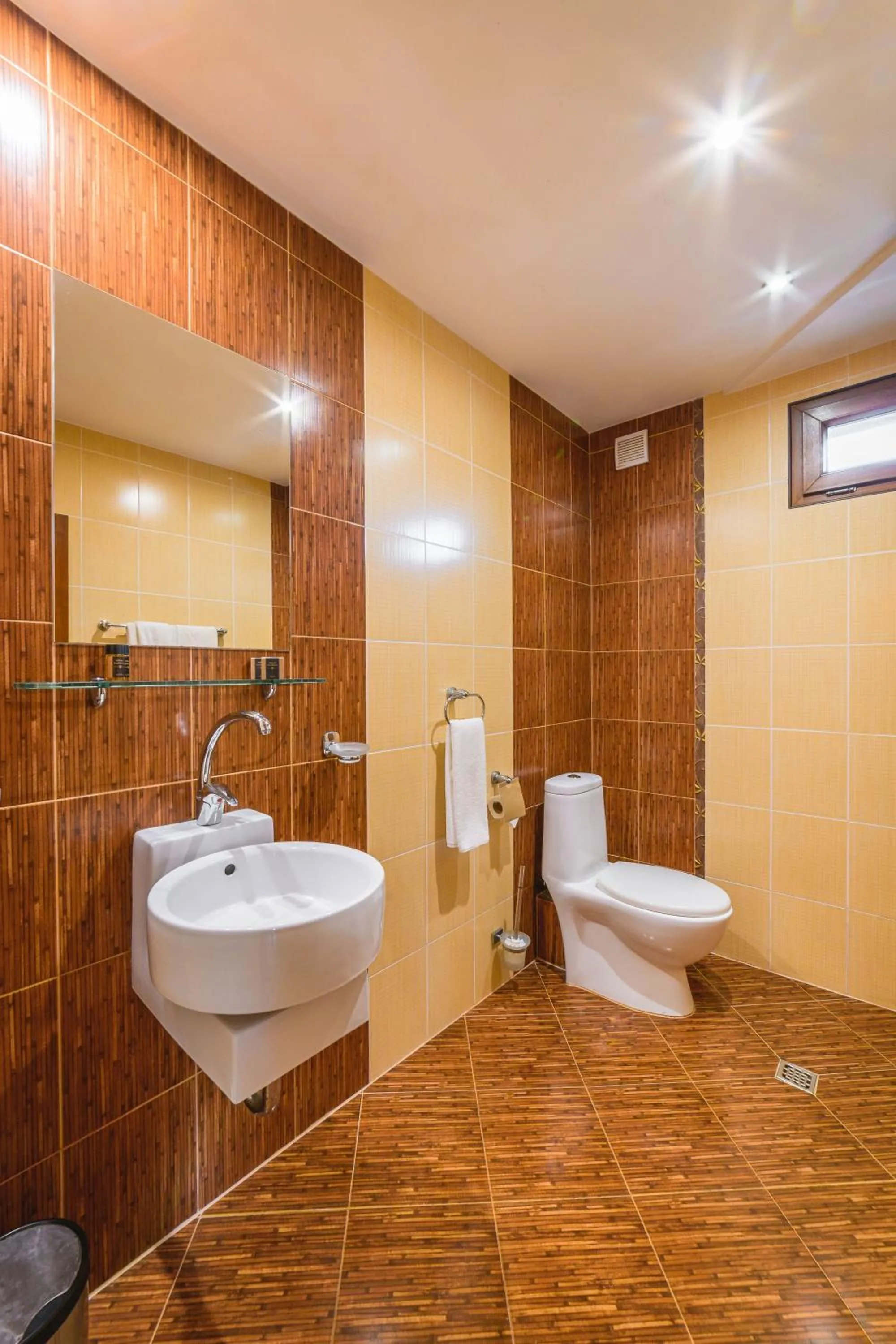 Bathroom in Eleganza Family Hotel - Free Parking