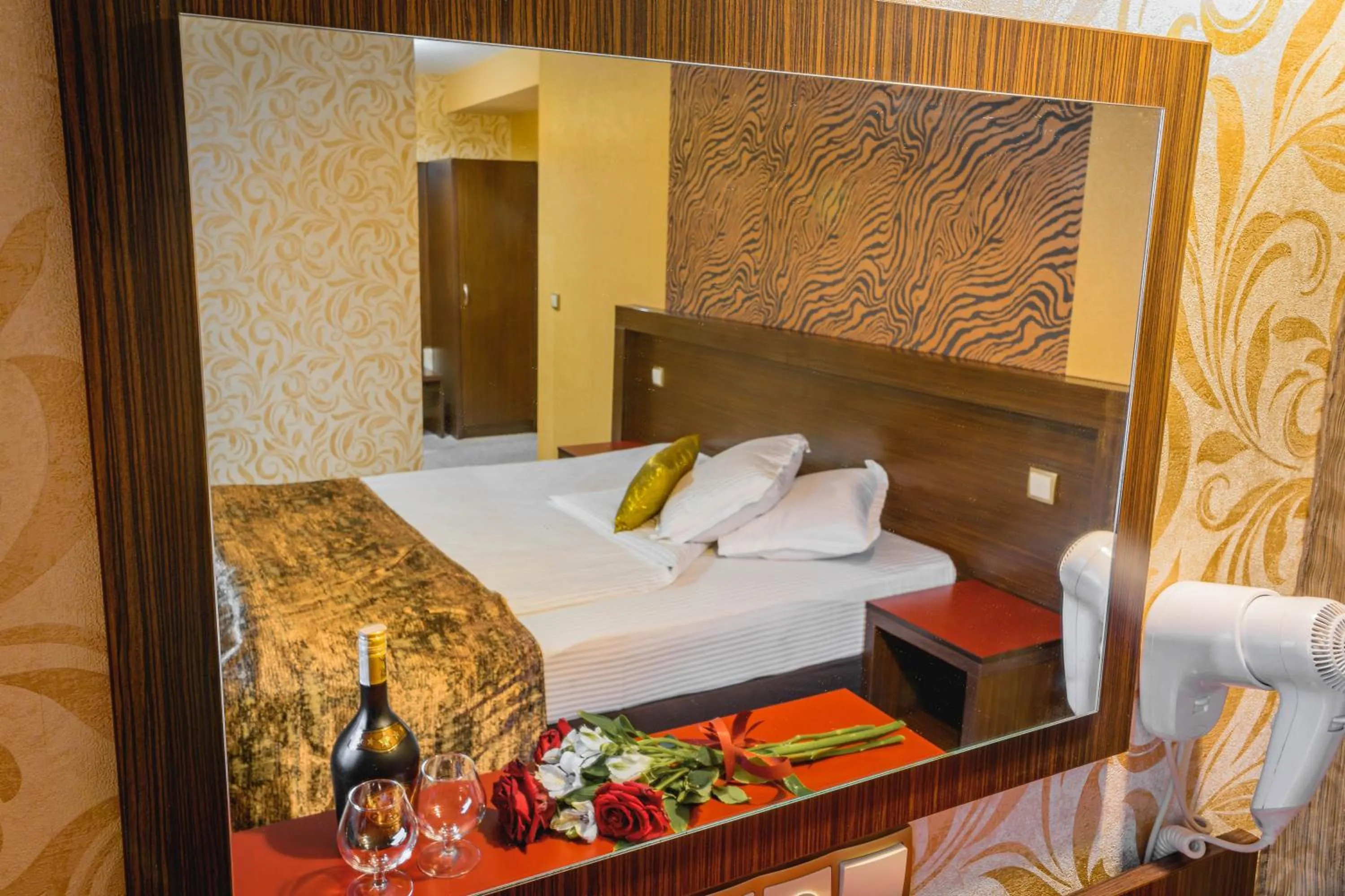 Bed in Eleganza Family Hotel - Free Parking