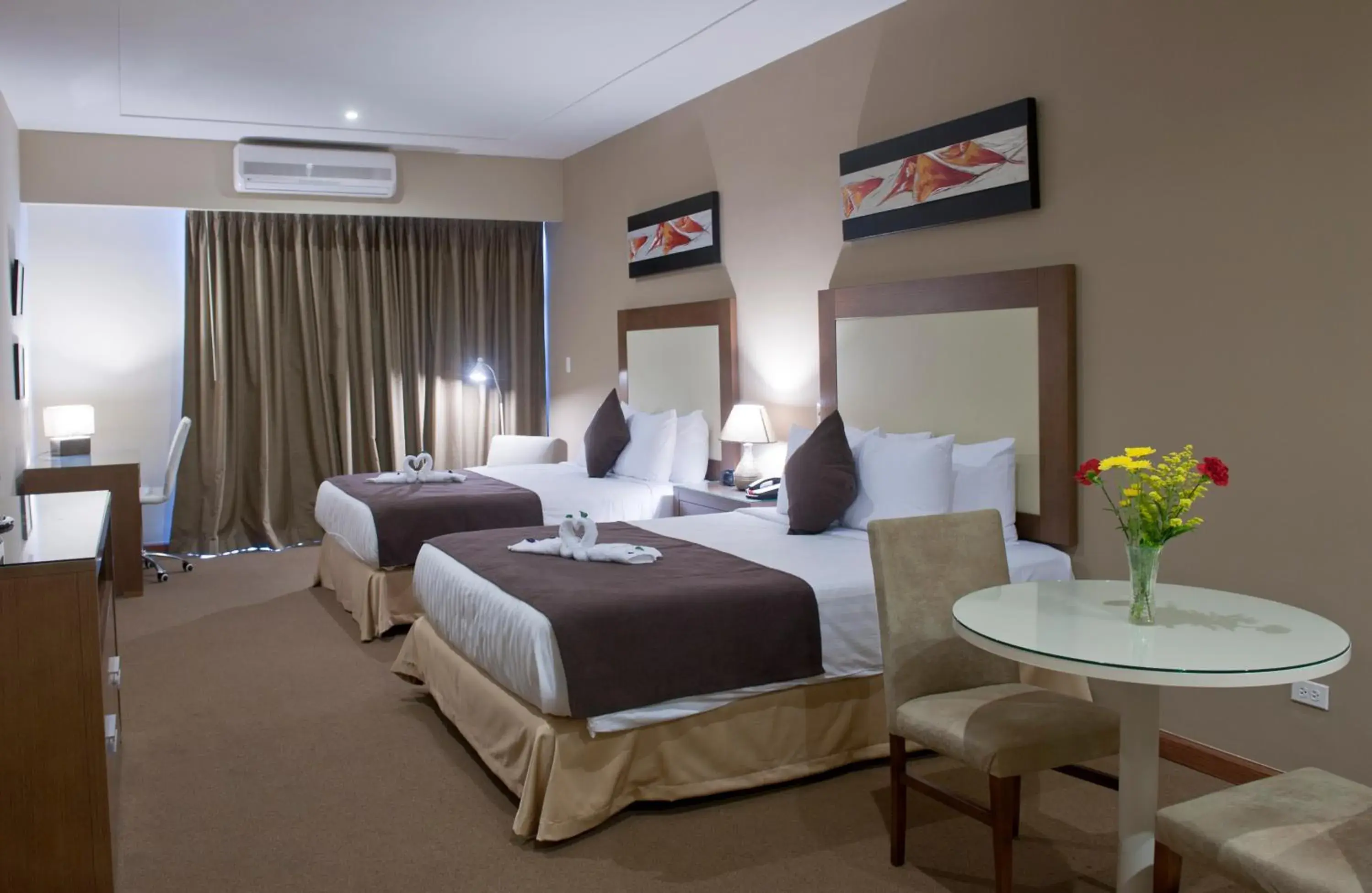 Deluxe Queen Room with Two Queen Beds - single occupancy in Central Park Hotel & Casino Deluxe Queen Room with Two Queen Beds - single occupancy in Central Park Hotel & Casino