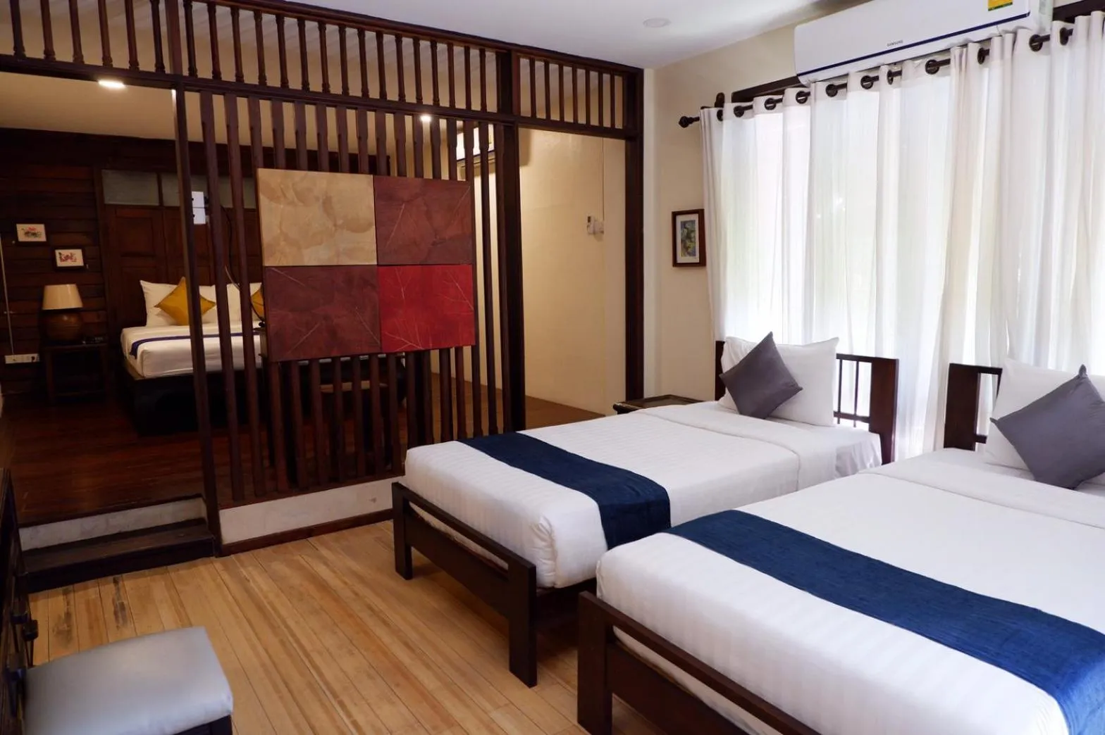 Bed in Sunny V Hotel