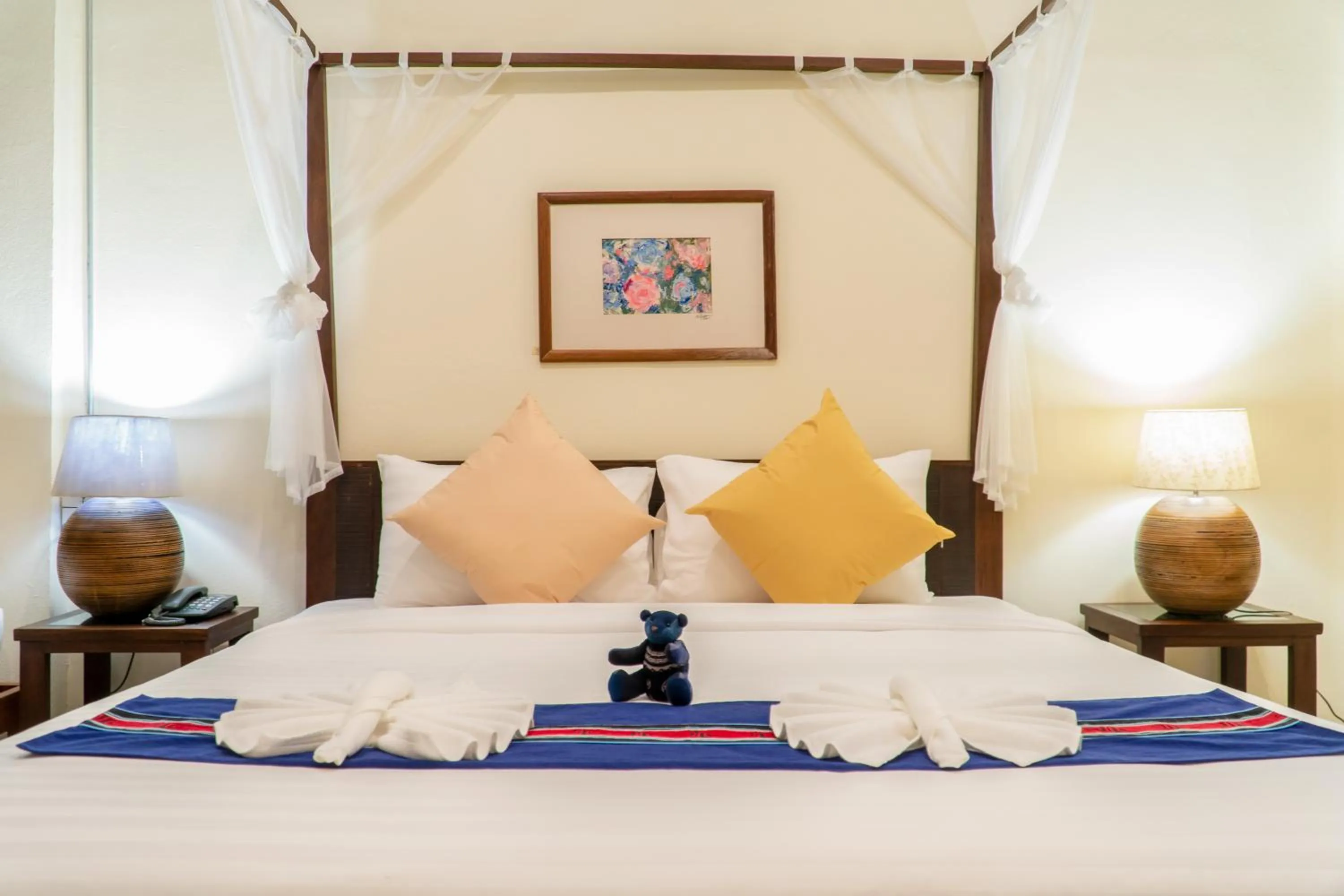 Bed in Sunny V Hotel