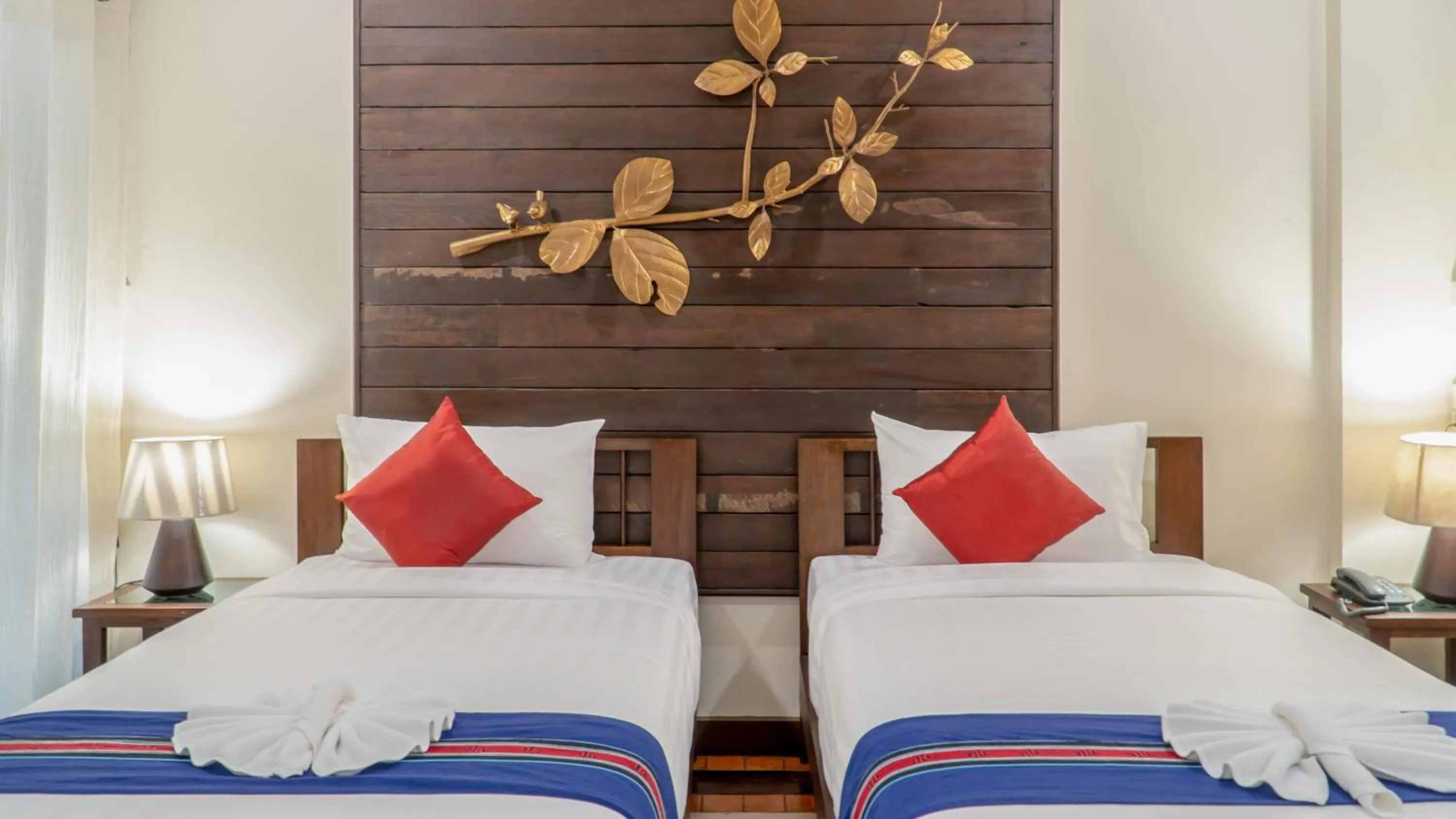 Bed in Sunny V Hotel