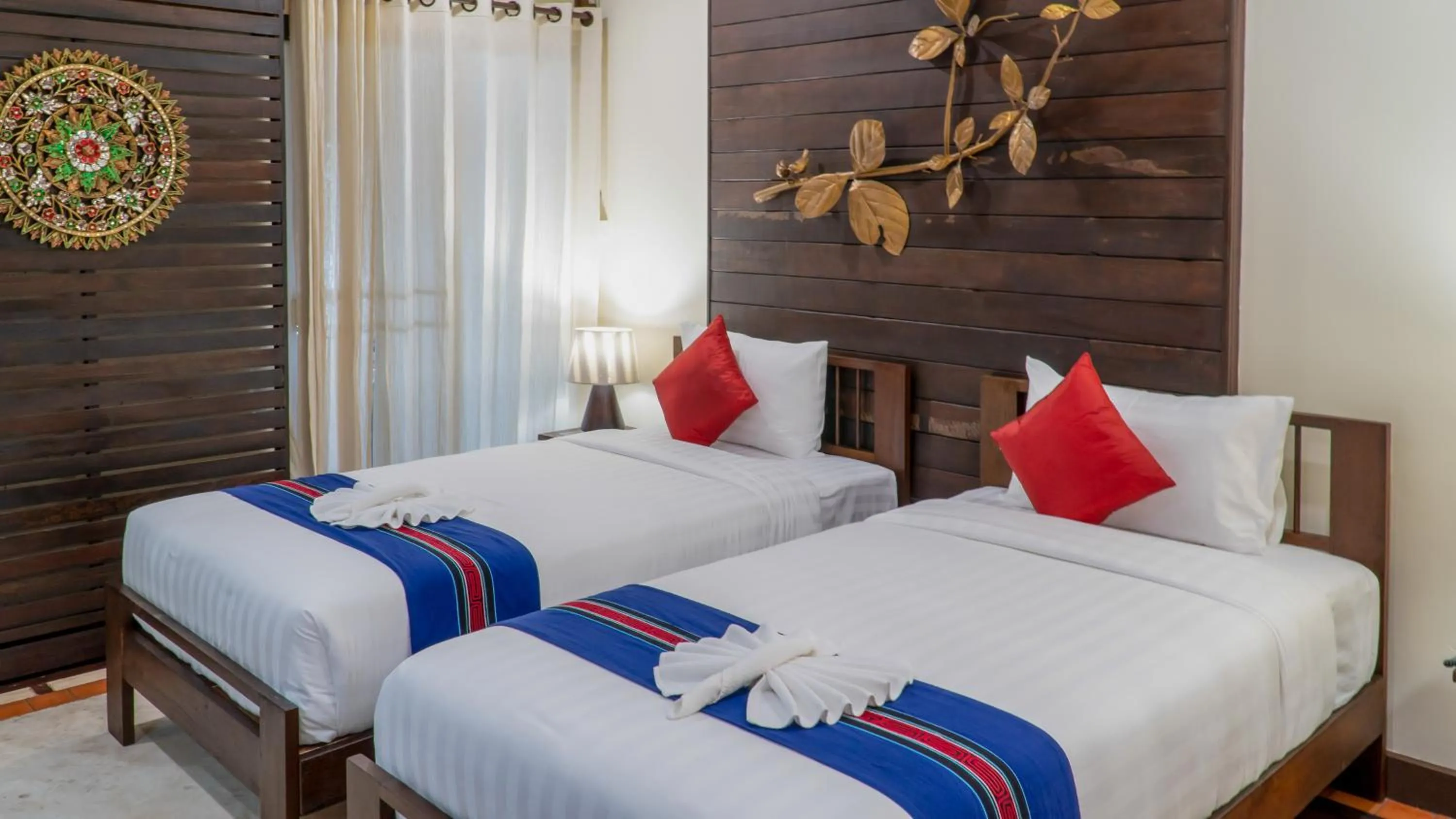 Bed in Sunny V Hotel