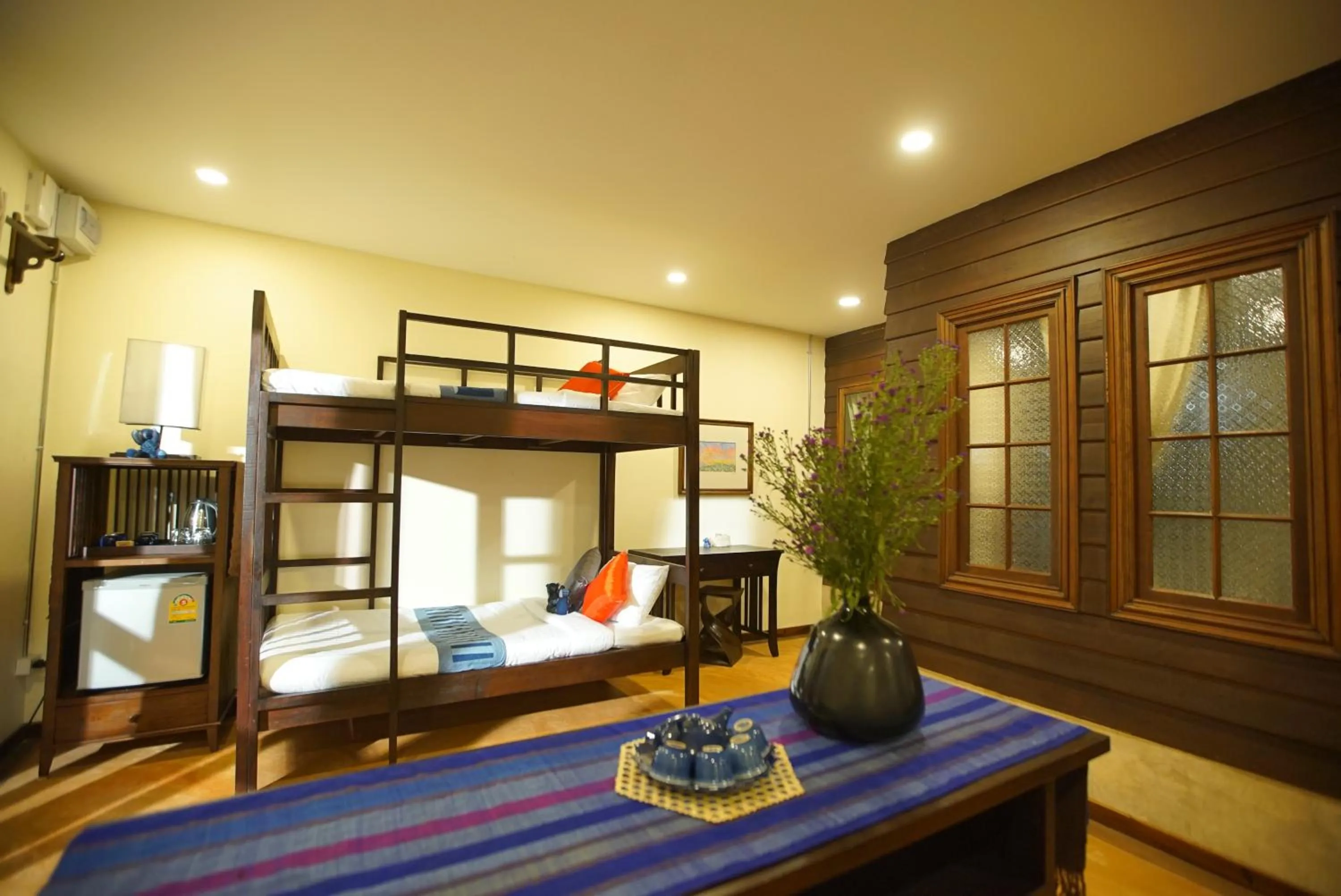 Bed in Sunny V Hotel