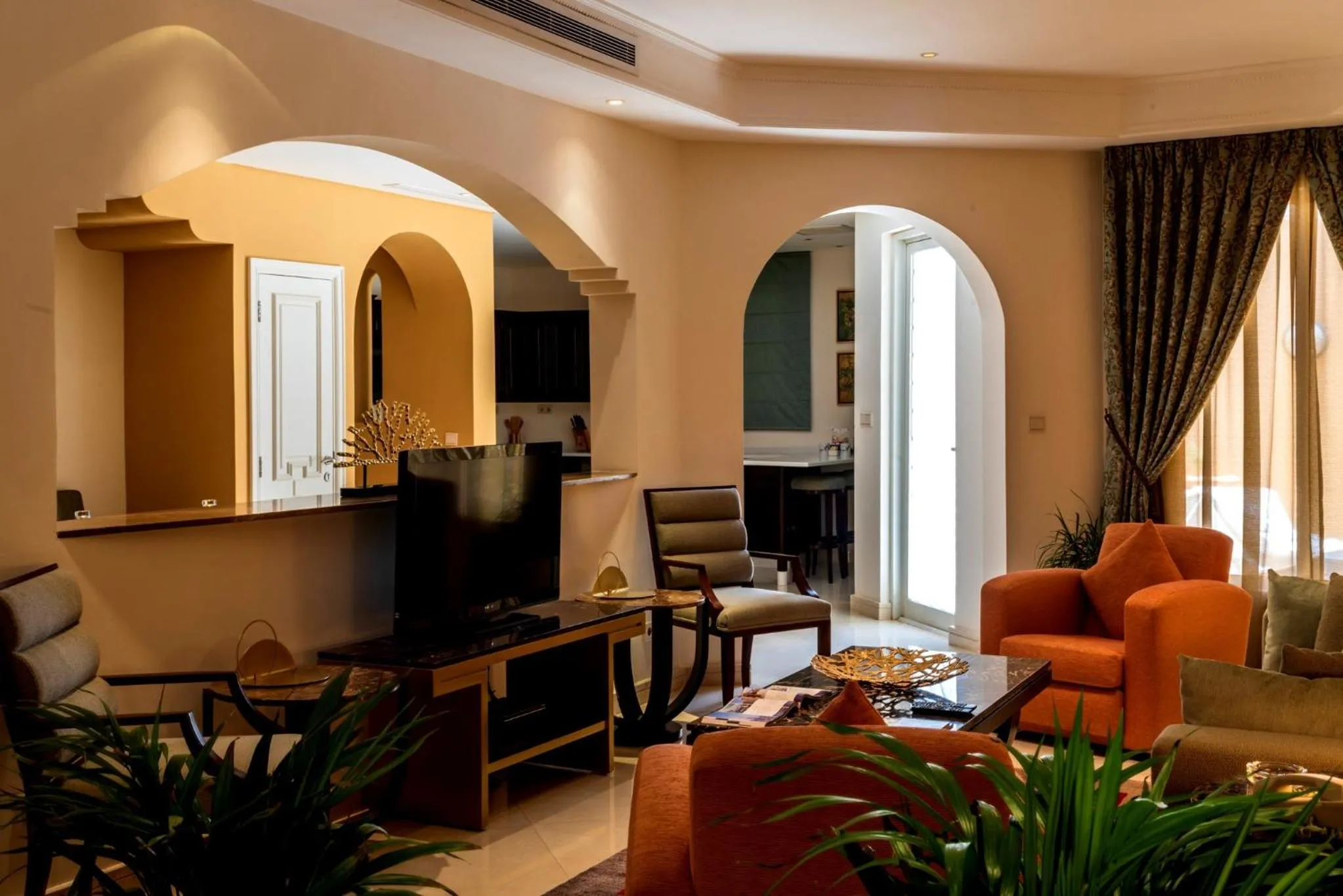 Communal lounge/ TV room in Vivienda Hotel Villas