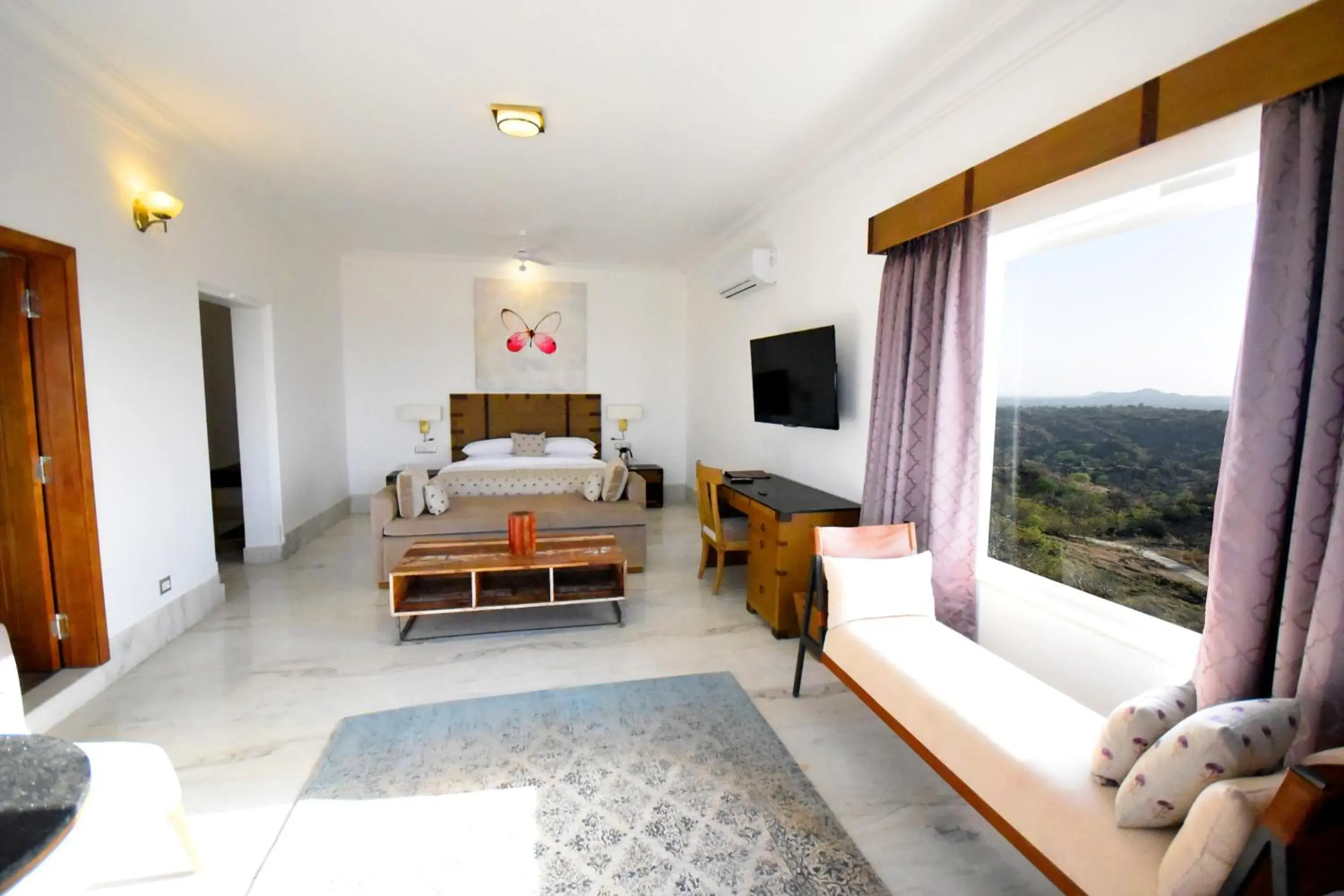 Living room, Bed in Fateh Safari Suites by Fateh Collection Living room, Bed in Fateh Safari Suites by Fateh Collection