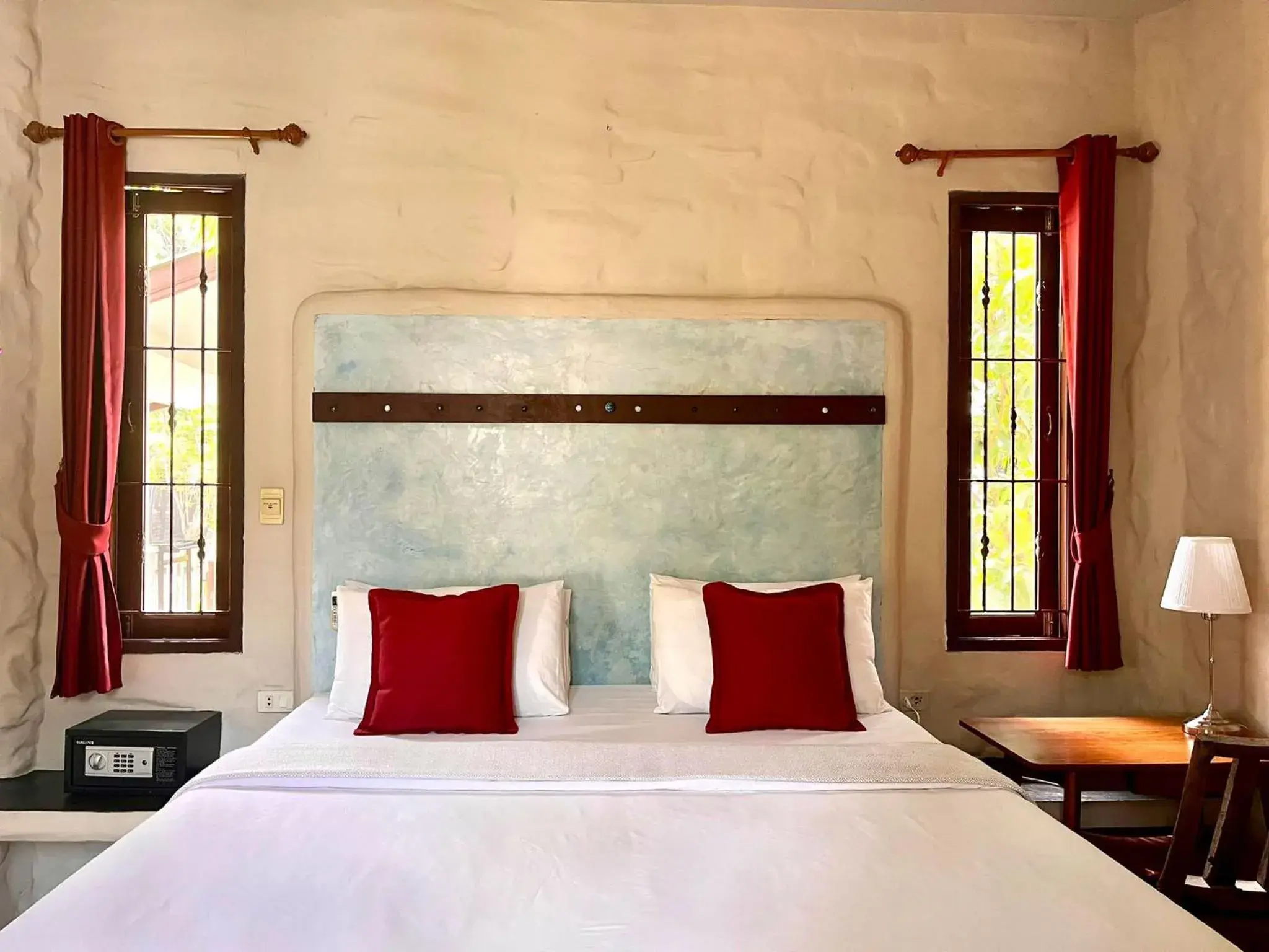 Bed in Sabaii Bay Resort Bed in Sabaii Bay Resort