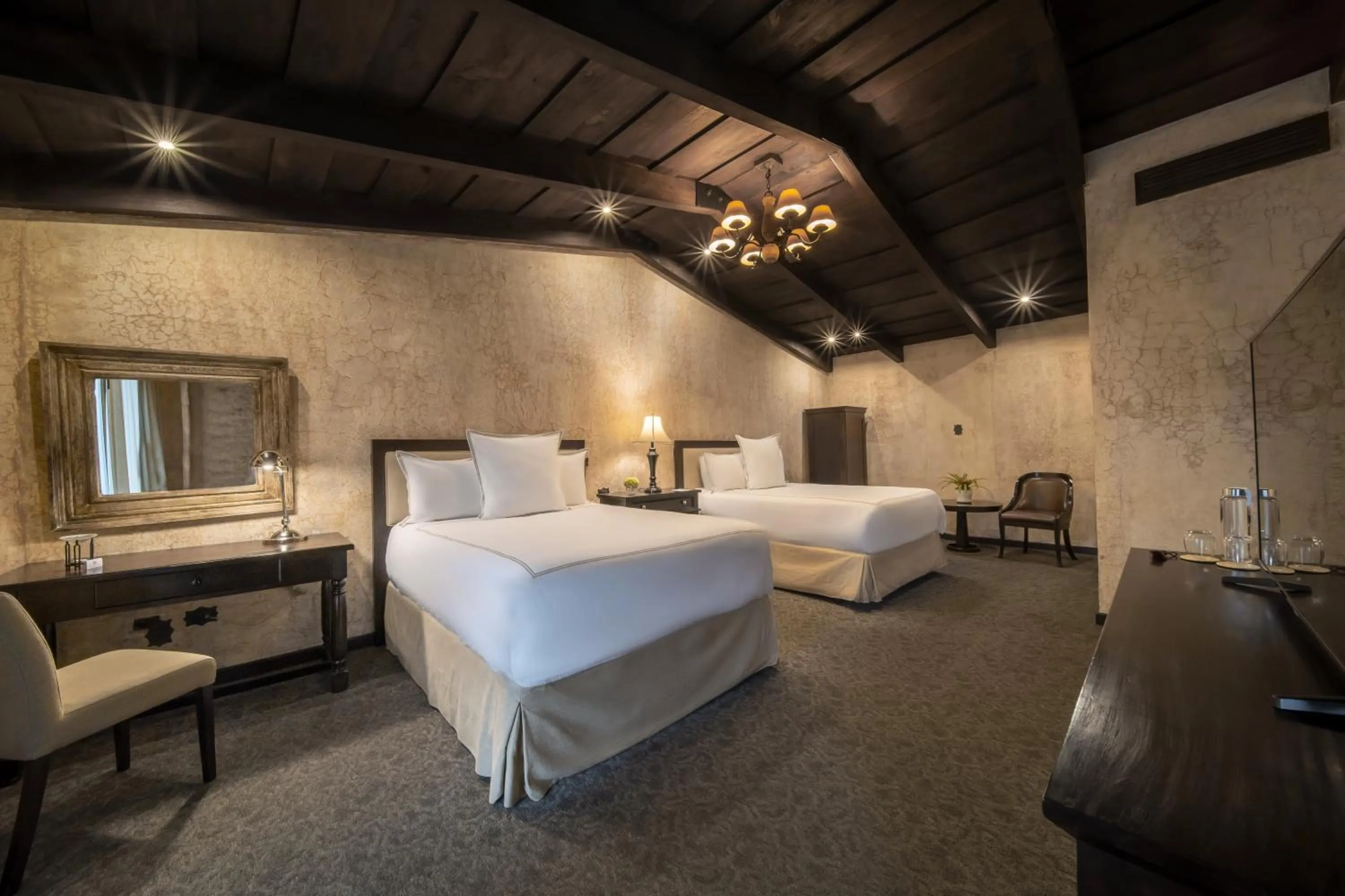 Bed in El Convento Boutique Hotel