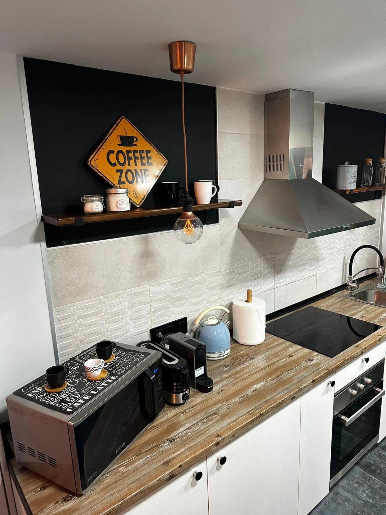 Kitchen or kitchenette in T-Homes - Cuenca