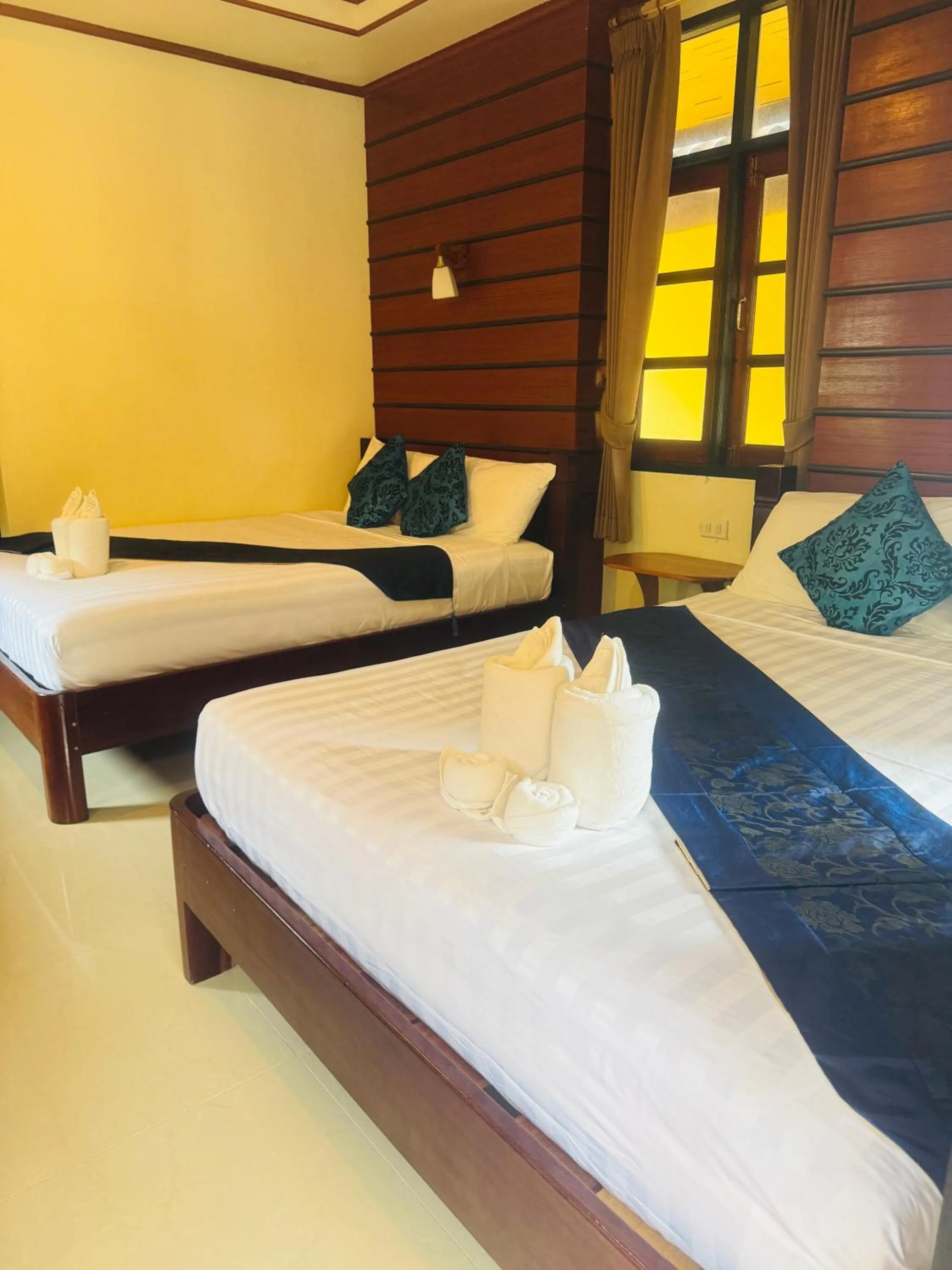 Bed in Starlight Haadrin Resort