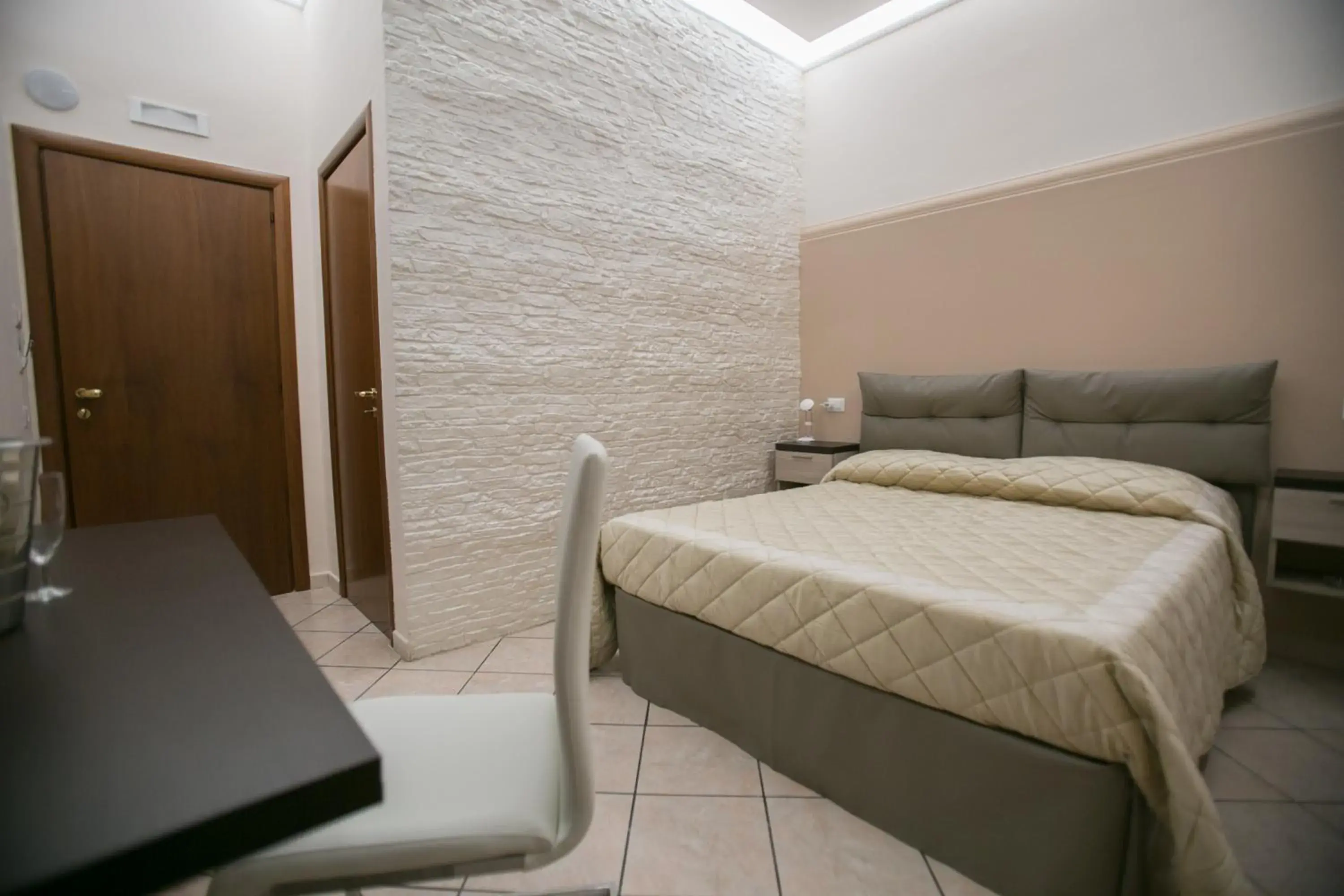 Photo of the whole room, Bed in Hotel la Fenice Photo of the whole room, Bed in Hotel la Fenice