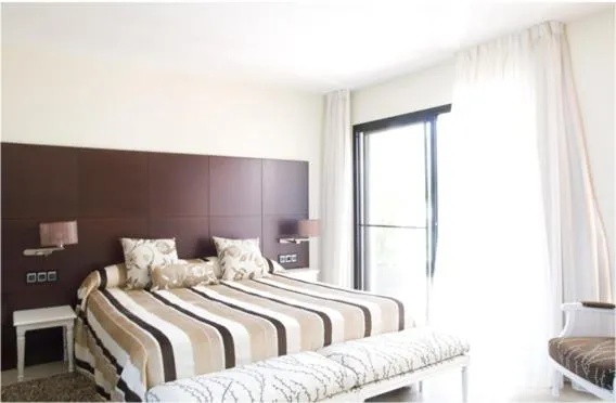 Photo of the whole room, Bed in Hotel Mar d'Espills - Adults Only