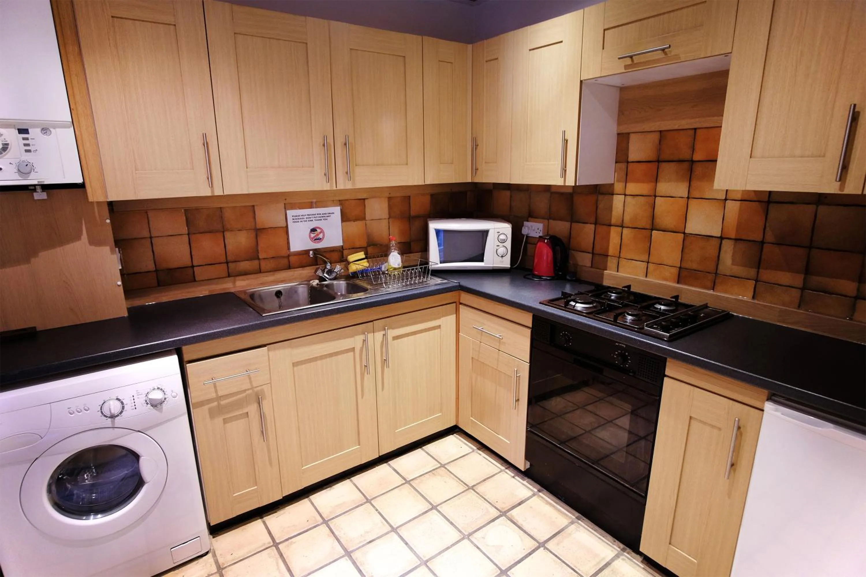 Kitchen or kitchenette in Regent House Hotel - City Centre Hotel