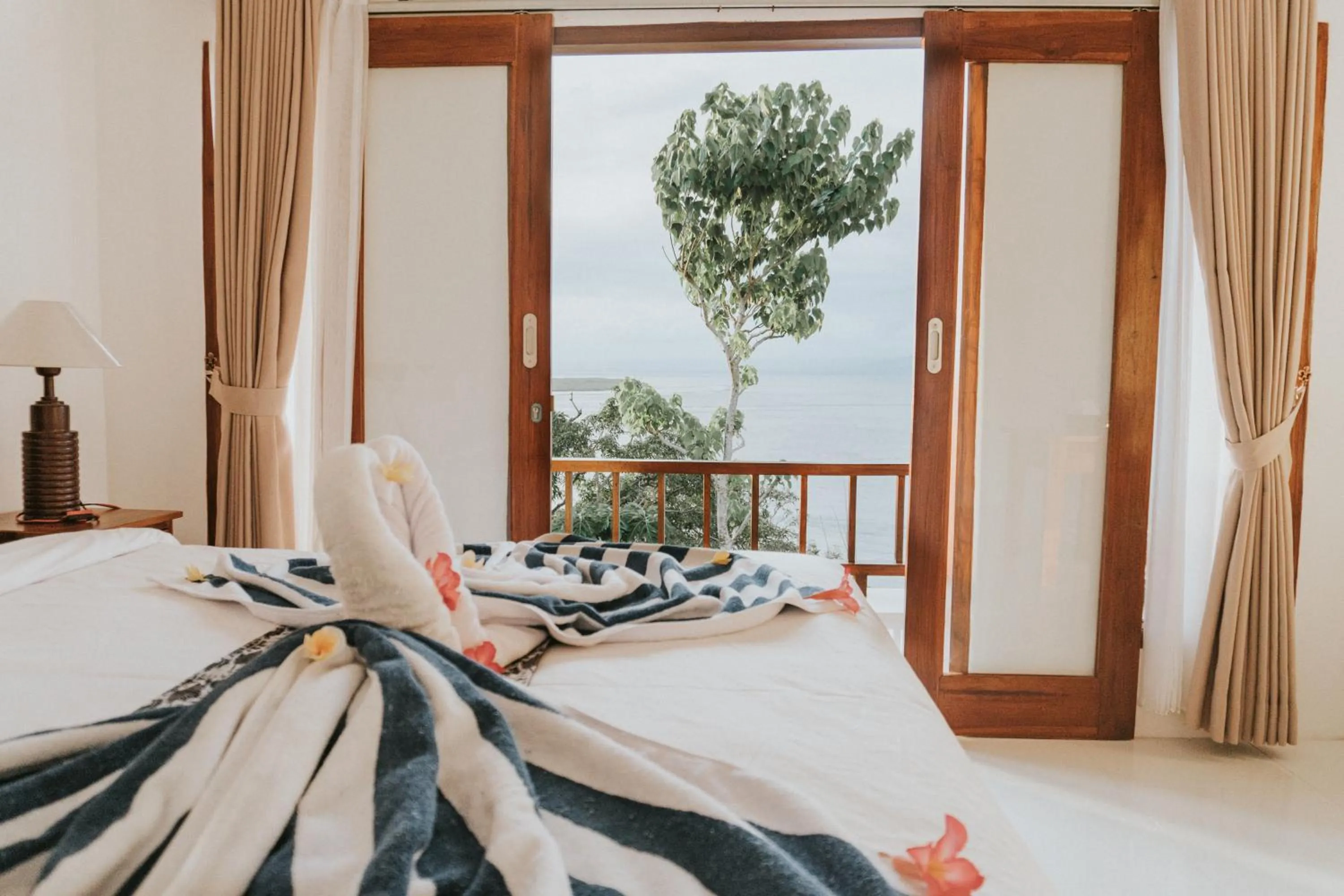 View (from property/room), Bed in Prasi Sunset Bungalows