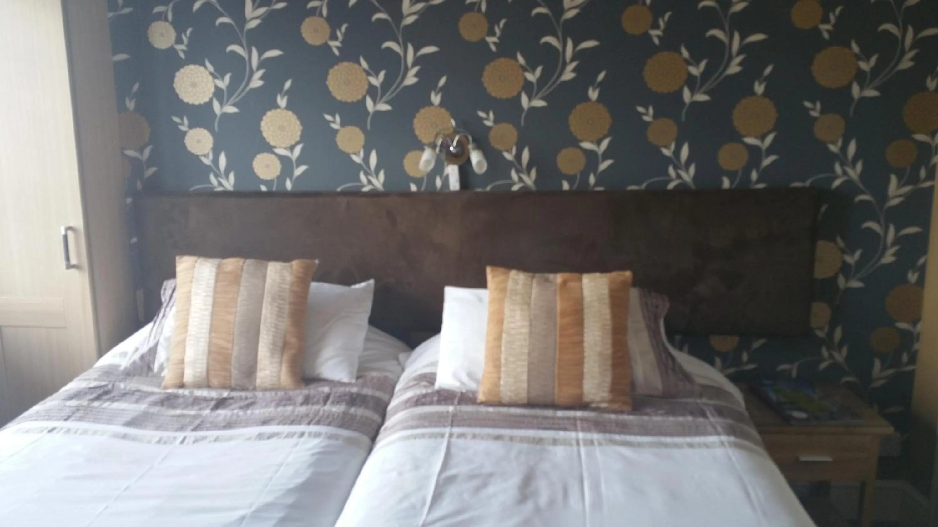 Decorative detail, Bed in Brentwood Guest House