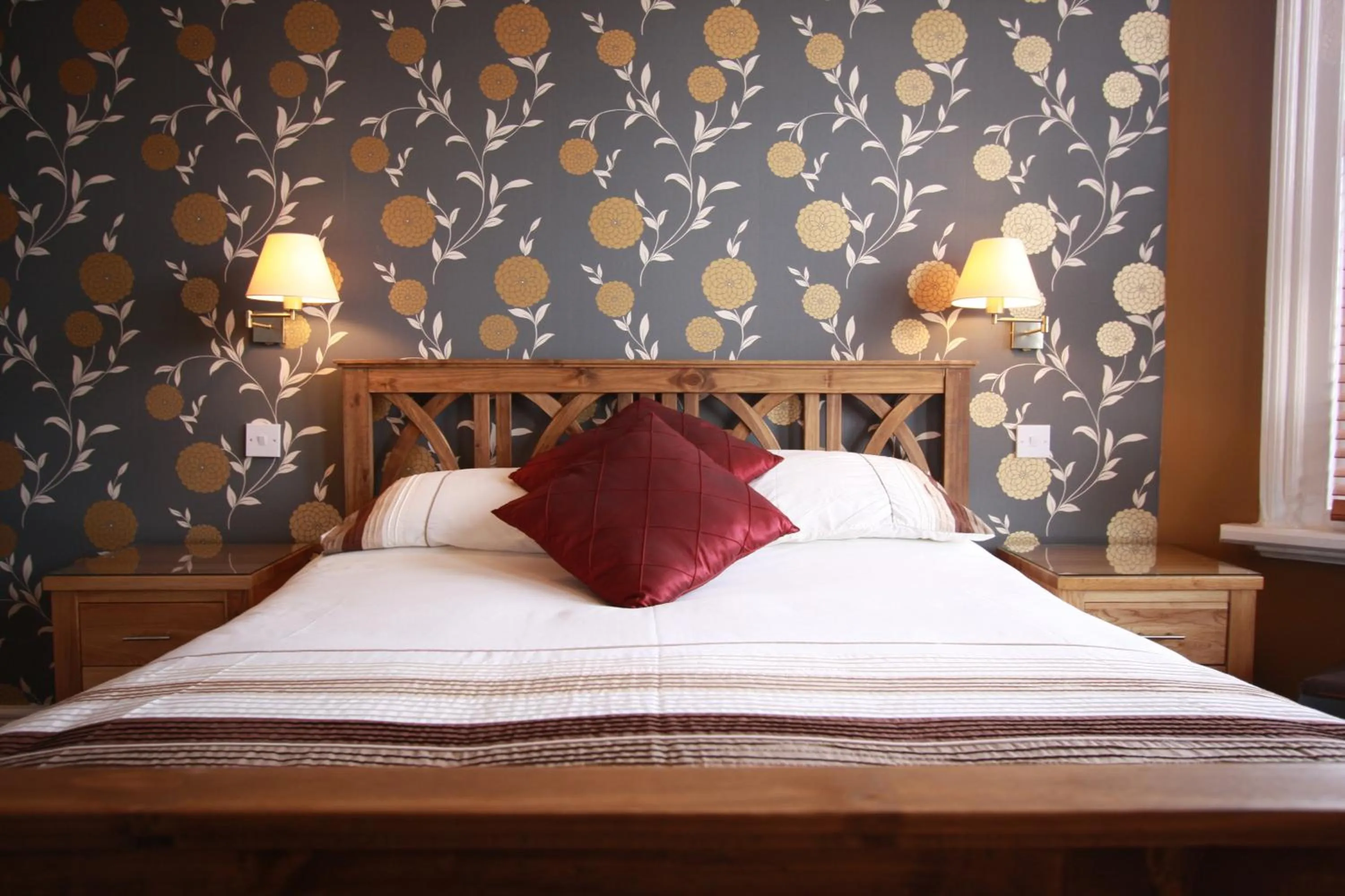 Bed in Brentwood Guest House