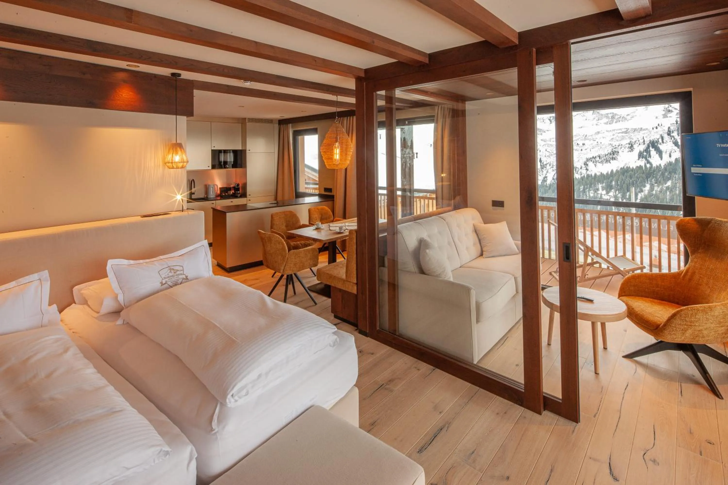 Living room, Bed in Hotel Walisgaden superior