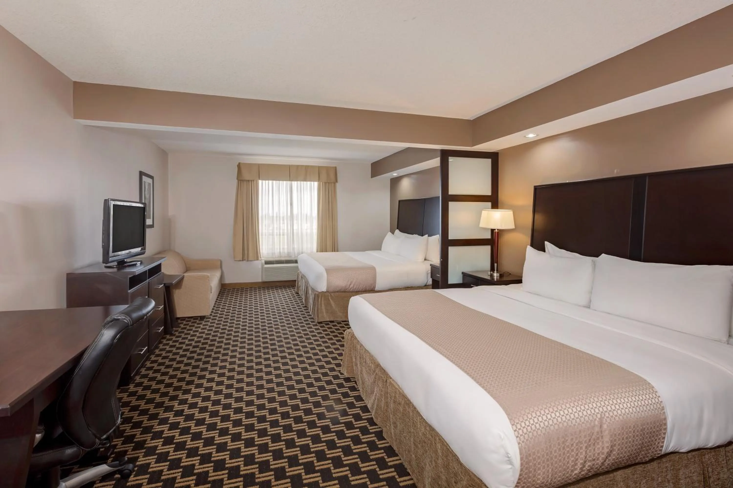 Bedroom, Bed in Ramada by Wyndham Cold Lake