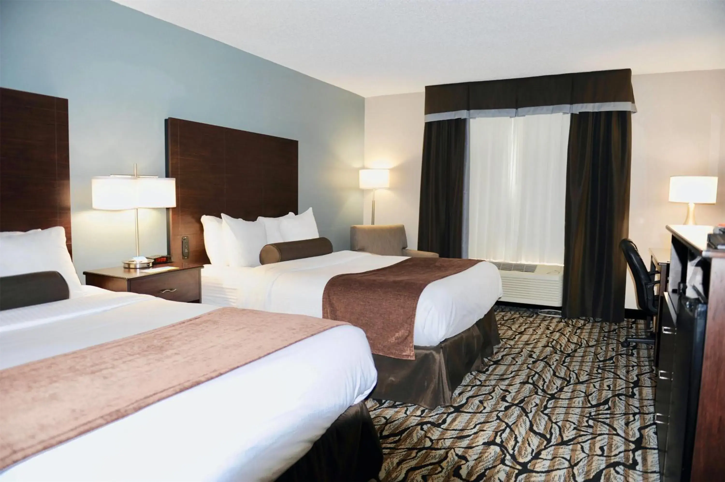 Bed in Days Inn & Suites by Wyndham Wausau Bed in Days Inn & Suites by Wyndham Wausau