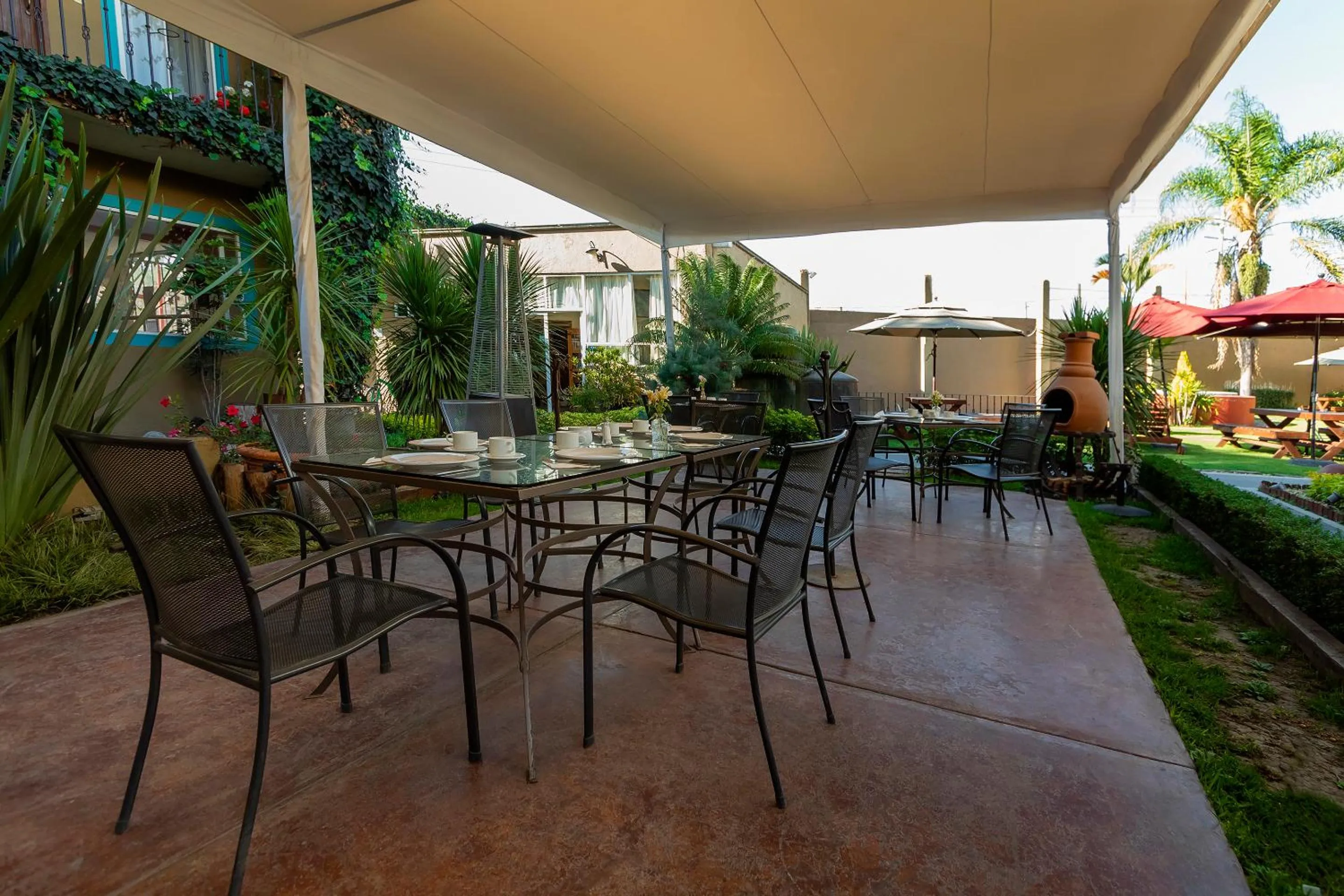 Dining area in Capital O Hotel La Huerta Golf & Hotel, Cholula