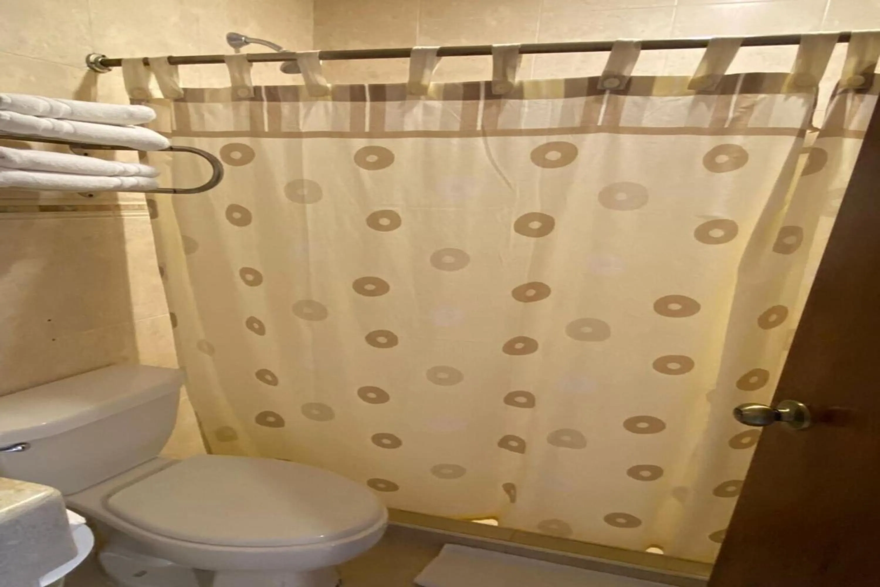 Bathroom in Capital O Hotel La Huerta Golf & Hotel, Cholula