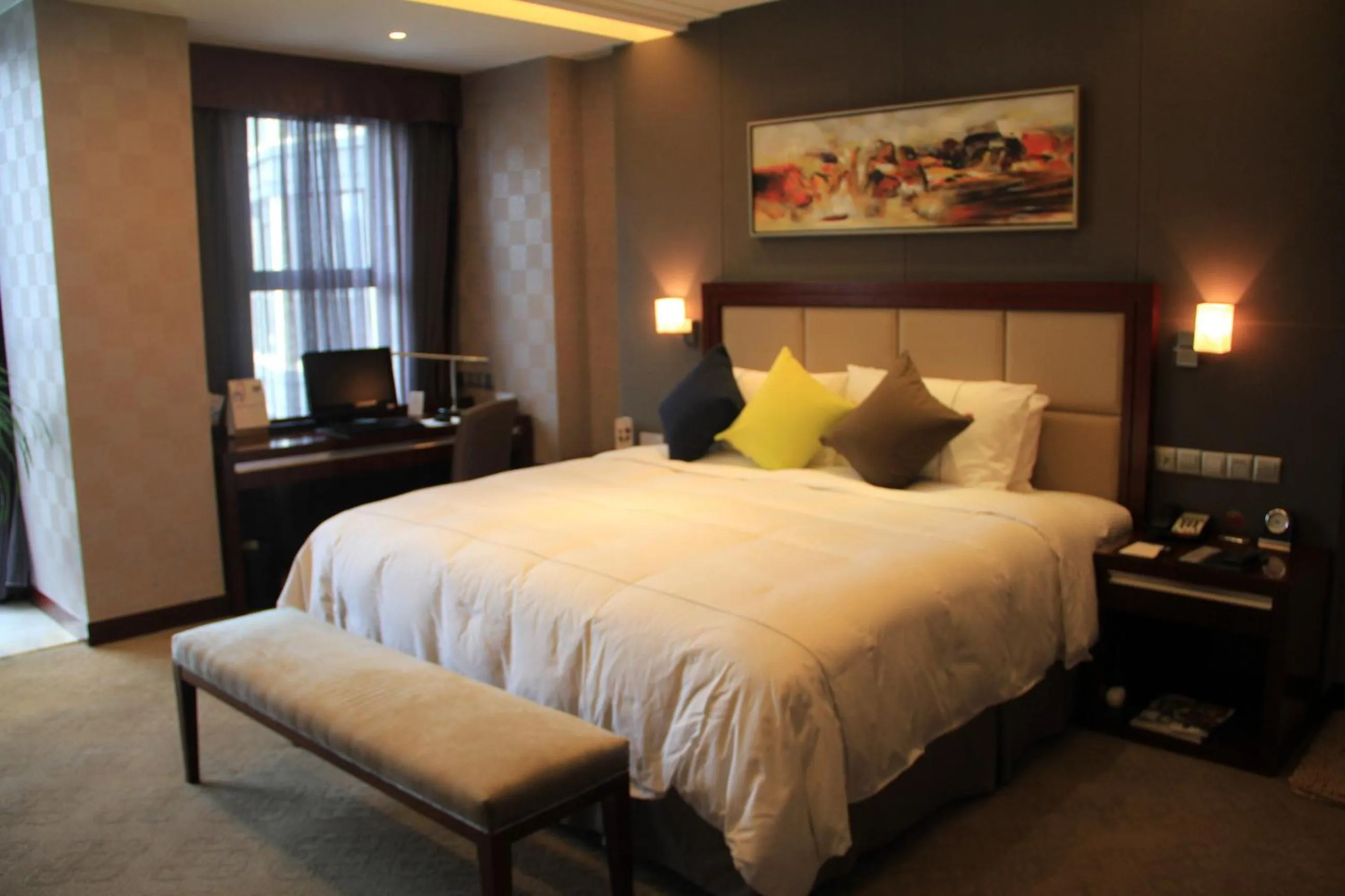 Bed in Grand Metropark Universal Dinosaur Town Hotel