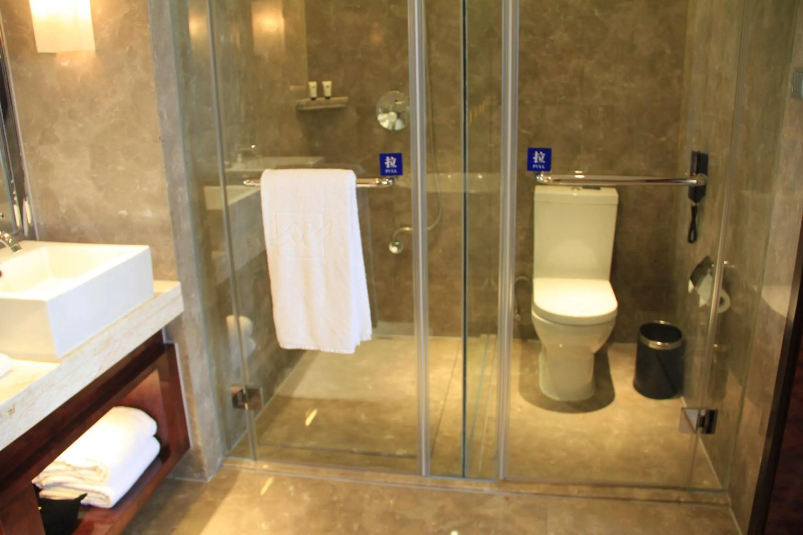 Shower in Grand Metropark Universal Dinosaur Town Hotel