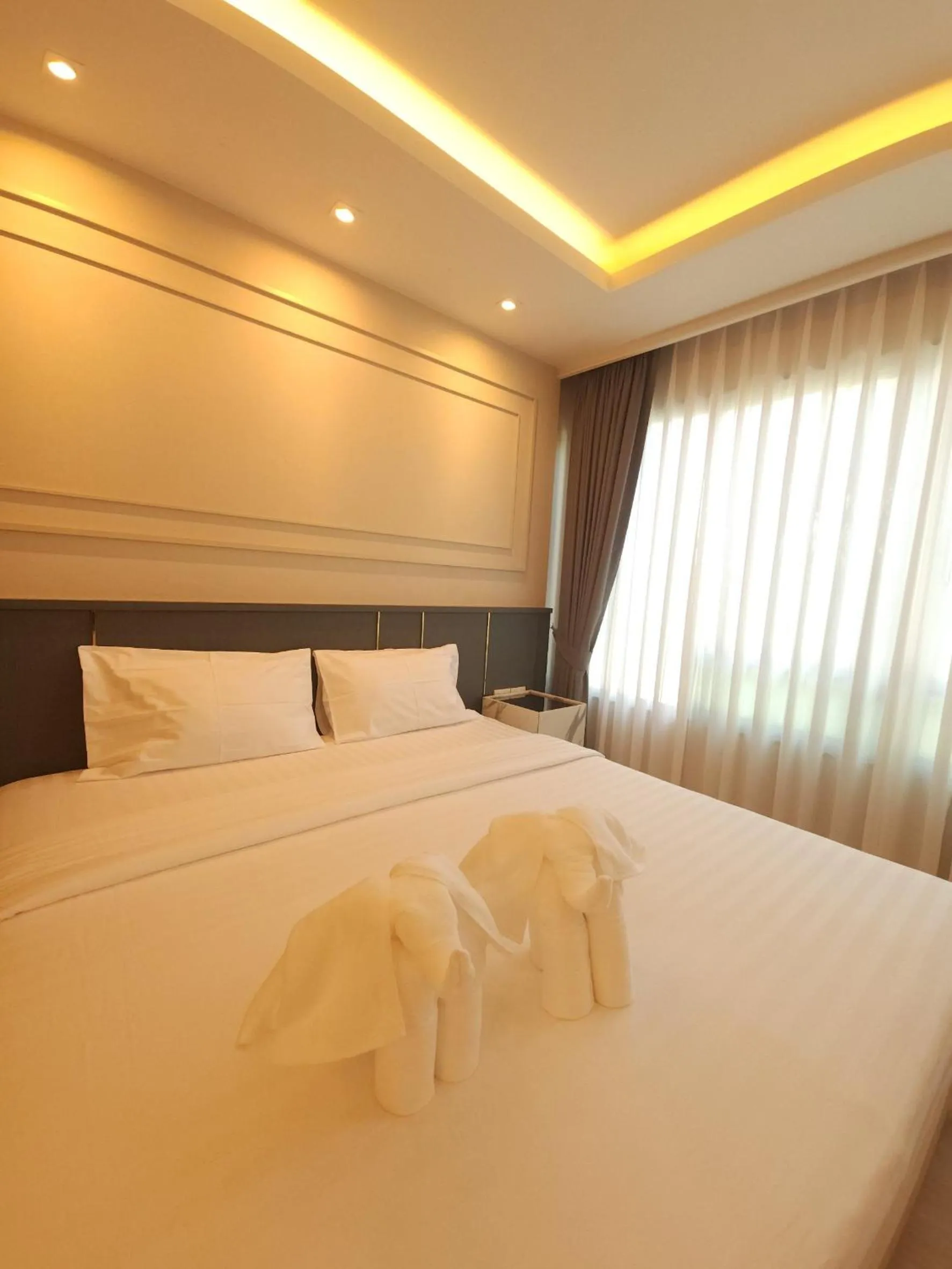 Bed in The Regent ​Phuket ​Serviced Apartment ​Kamala ​Beach