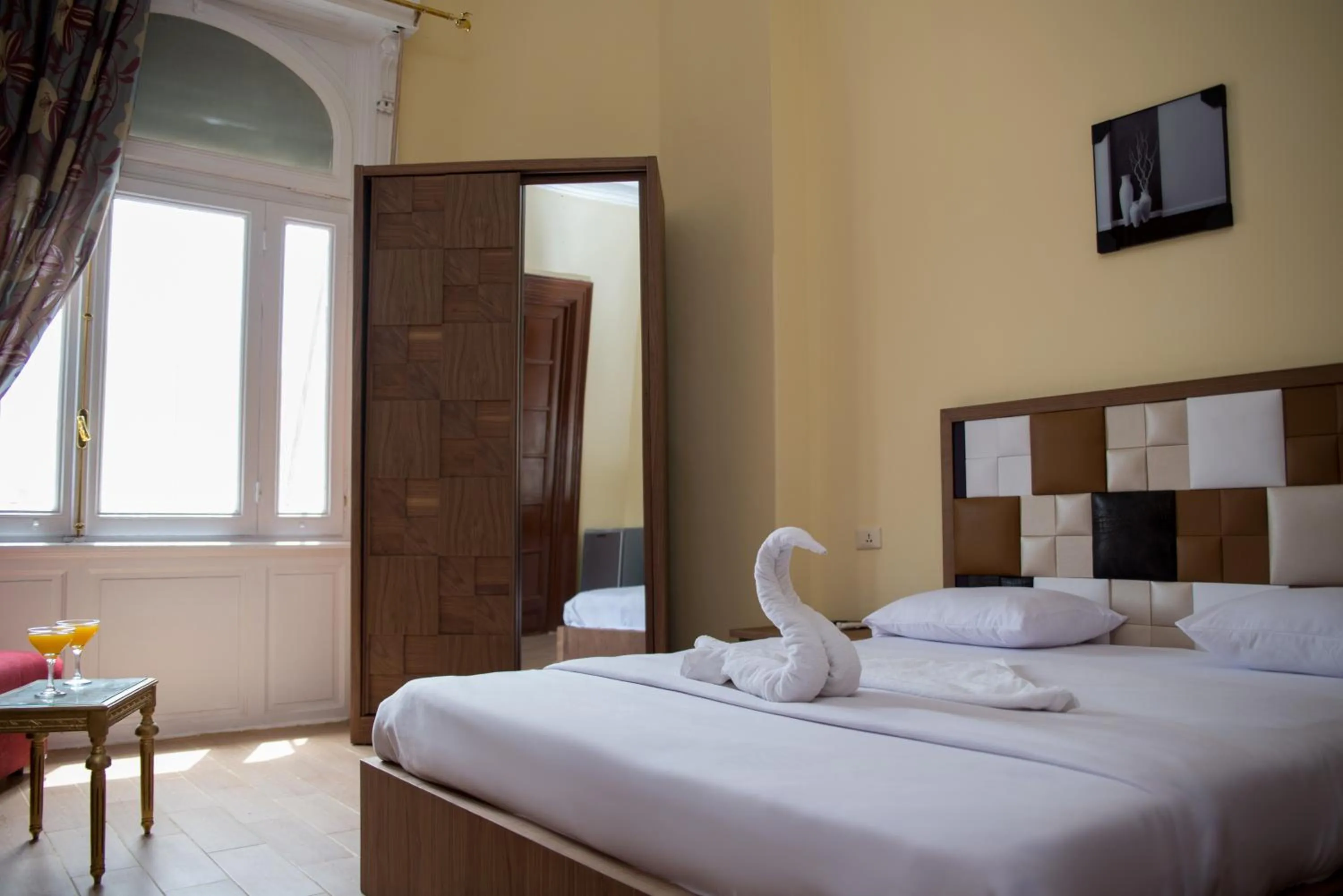 Bed in New Grand Royal Hotel Cairo