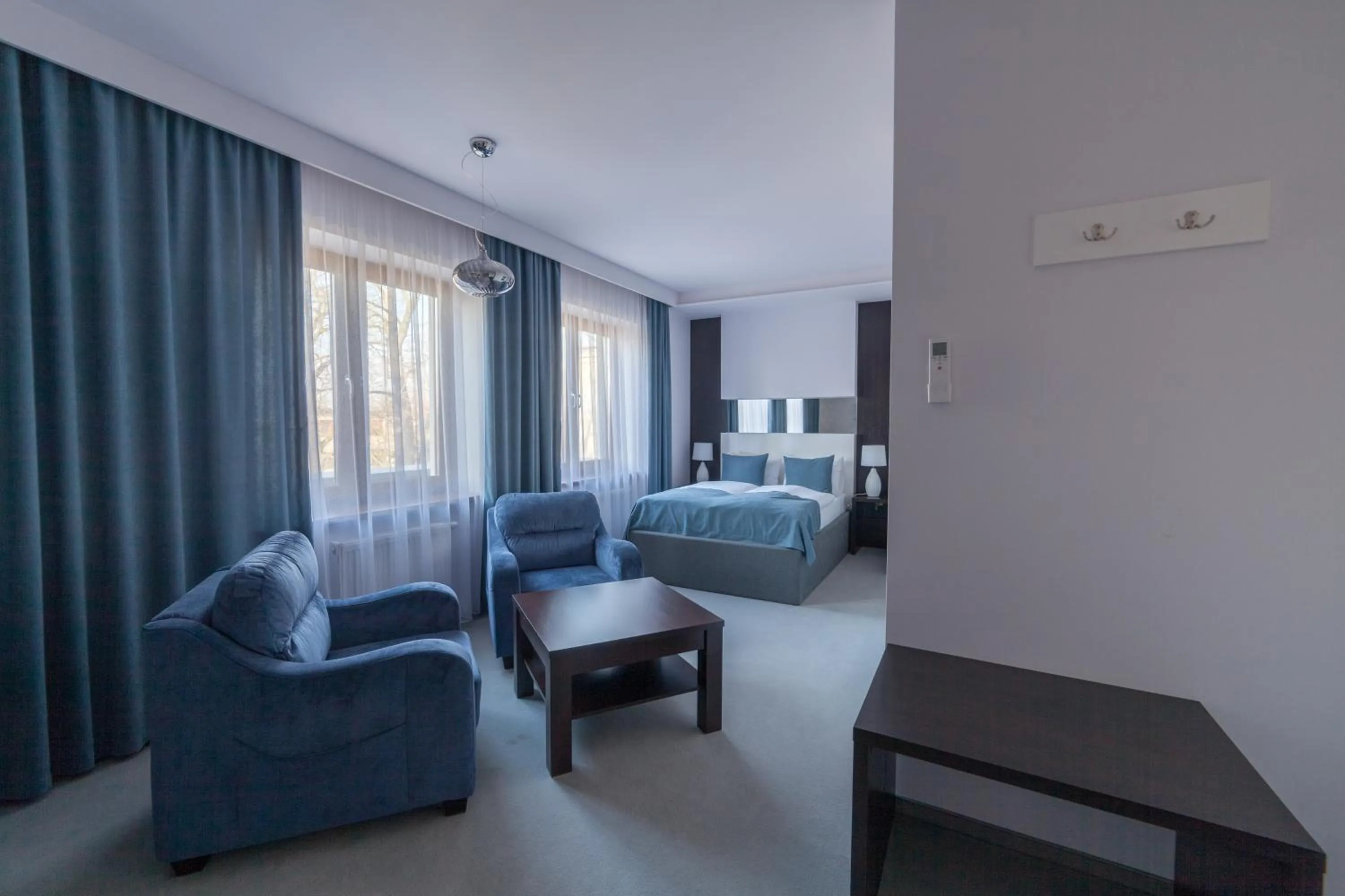 Living room, Bed in Novopolska - Hotel i Restauracja