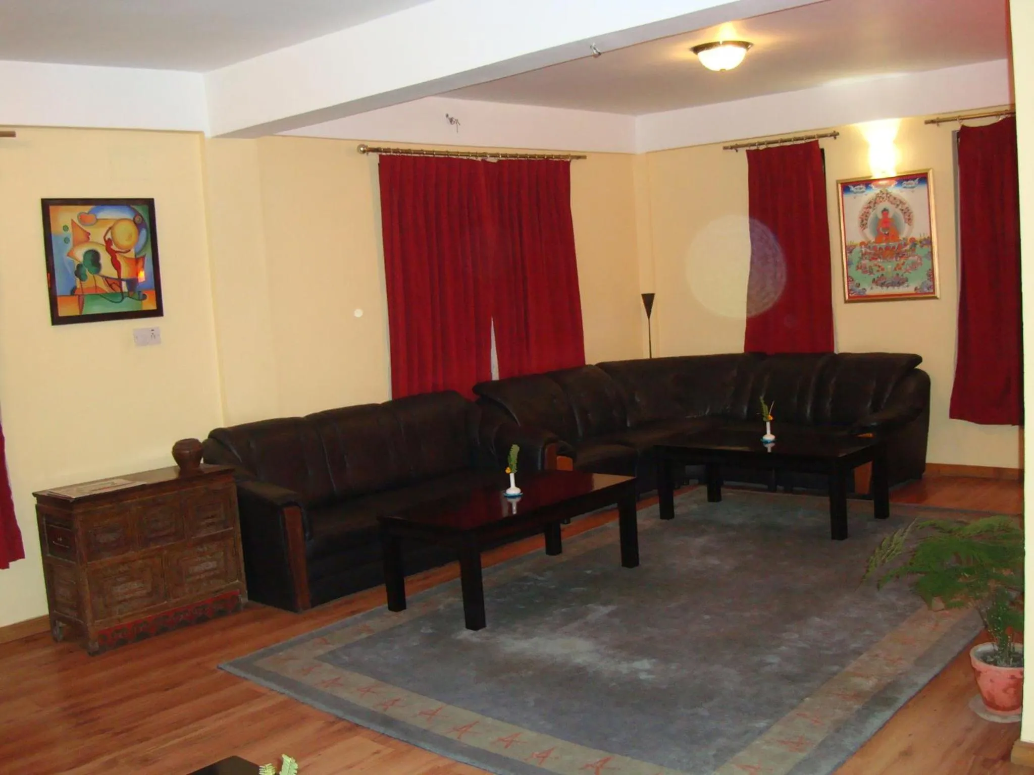 Communal lounge/ TV room in Royal Astoria Hotel