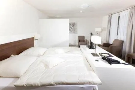 Photo of the whole room, Bed in Restaurant Niedmühle Land & Genuss Hotel