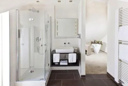 Bathroom in Restaurant Niedmühle Land & Genuss Hotel