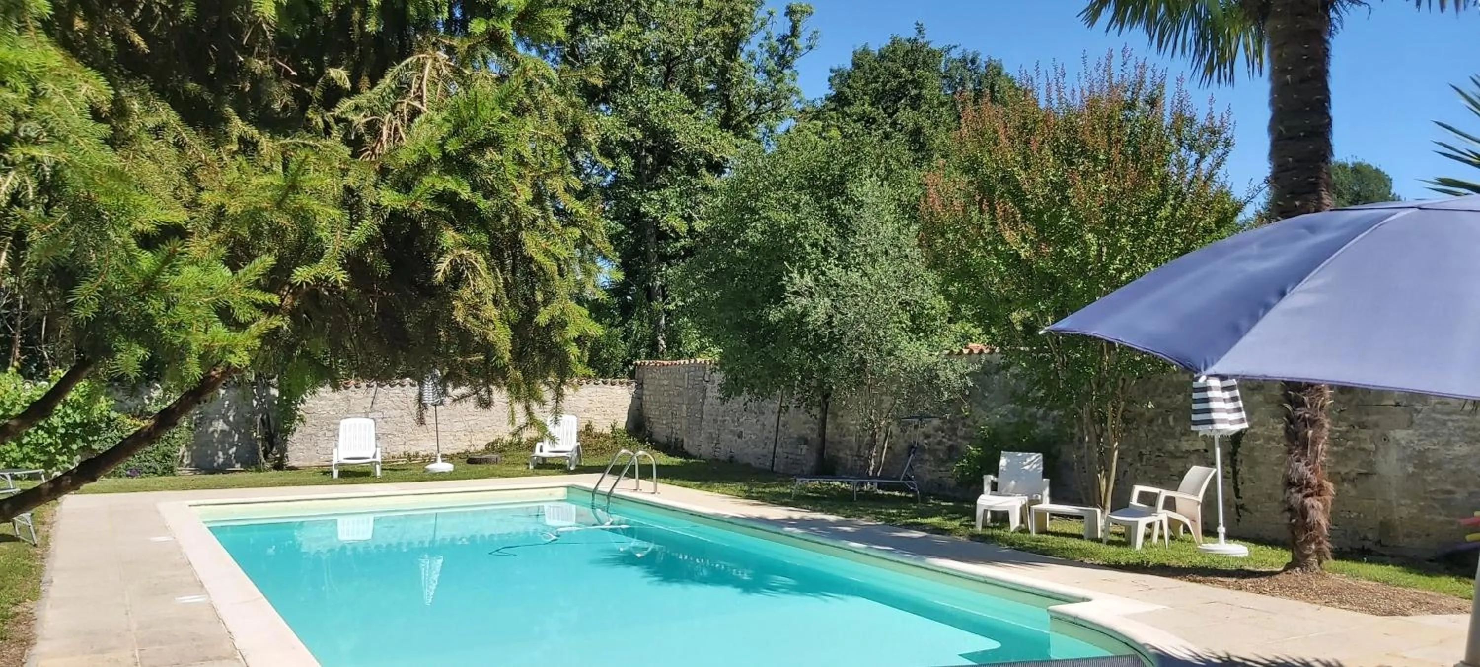 Swimming pool in Logis Des Bessons