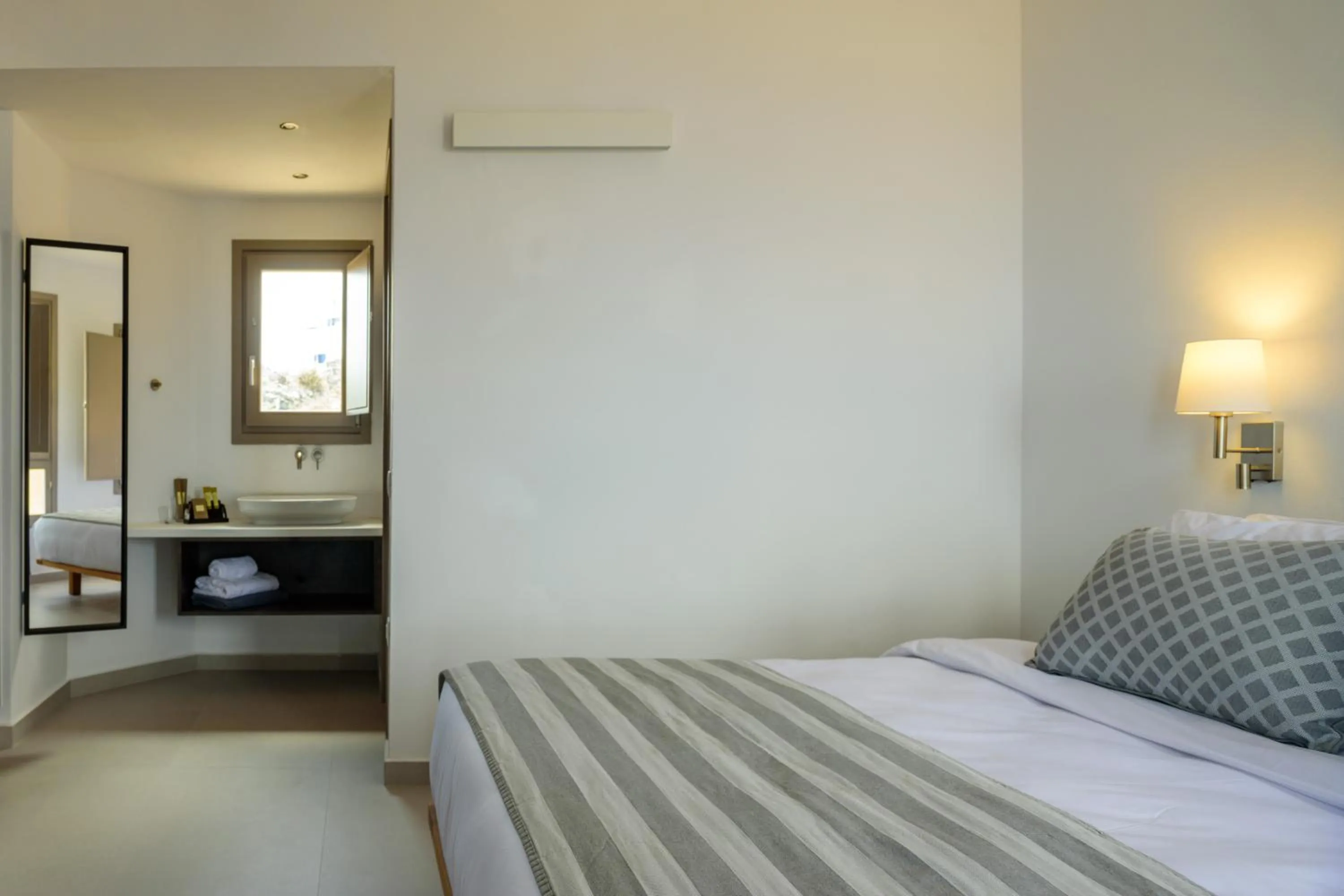 Bed in Kalestesia Suites