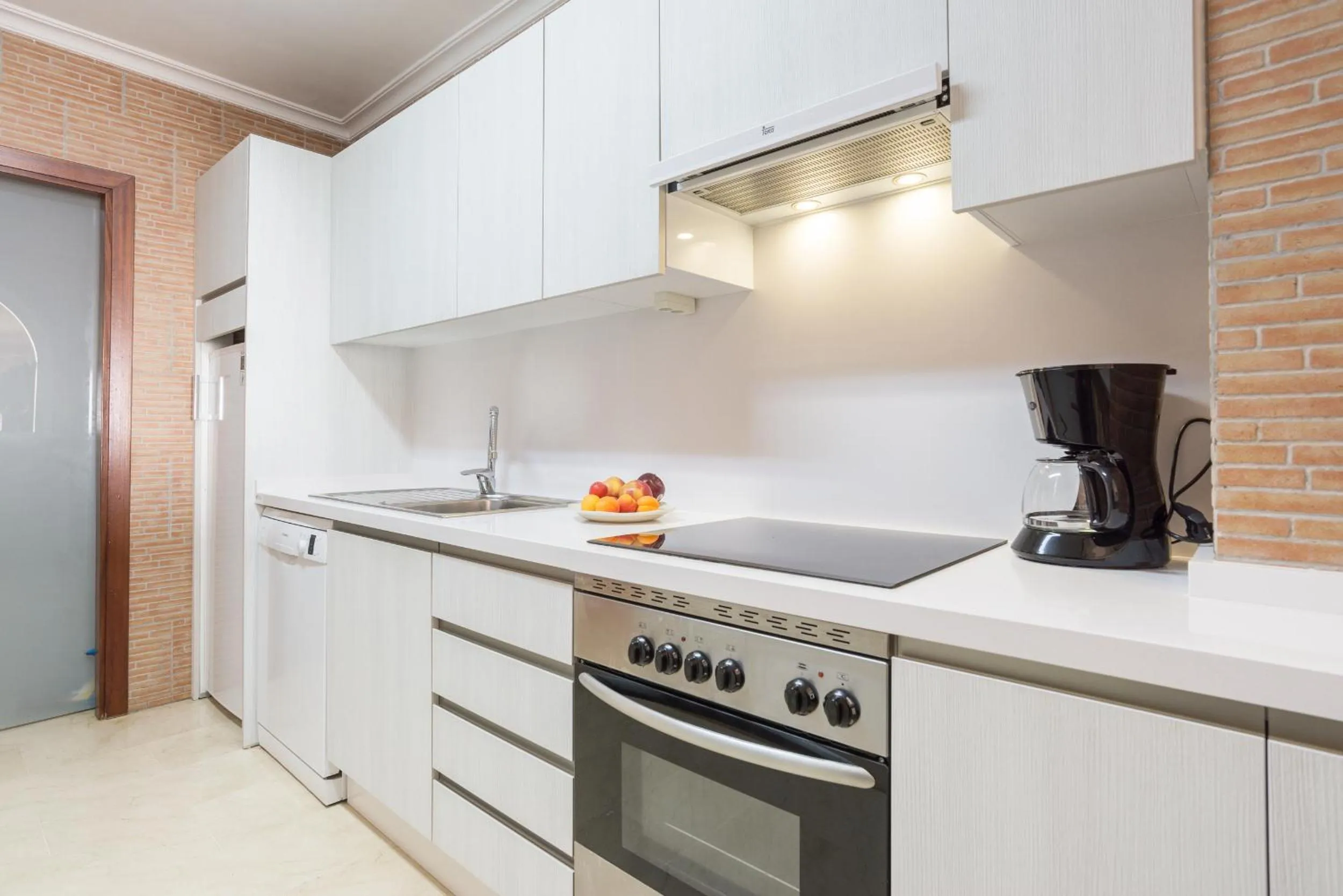 Kitchen or kitchenette in MalagaSuite Palm Beach Fuengirola