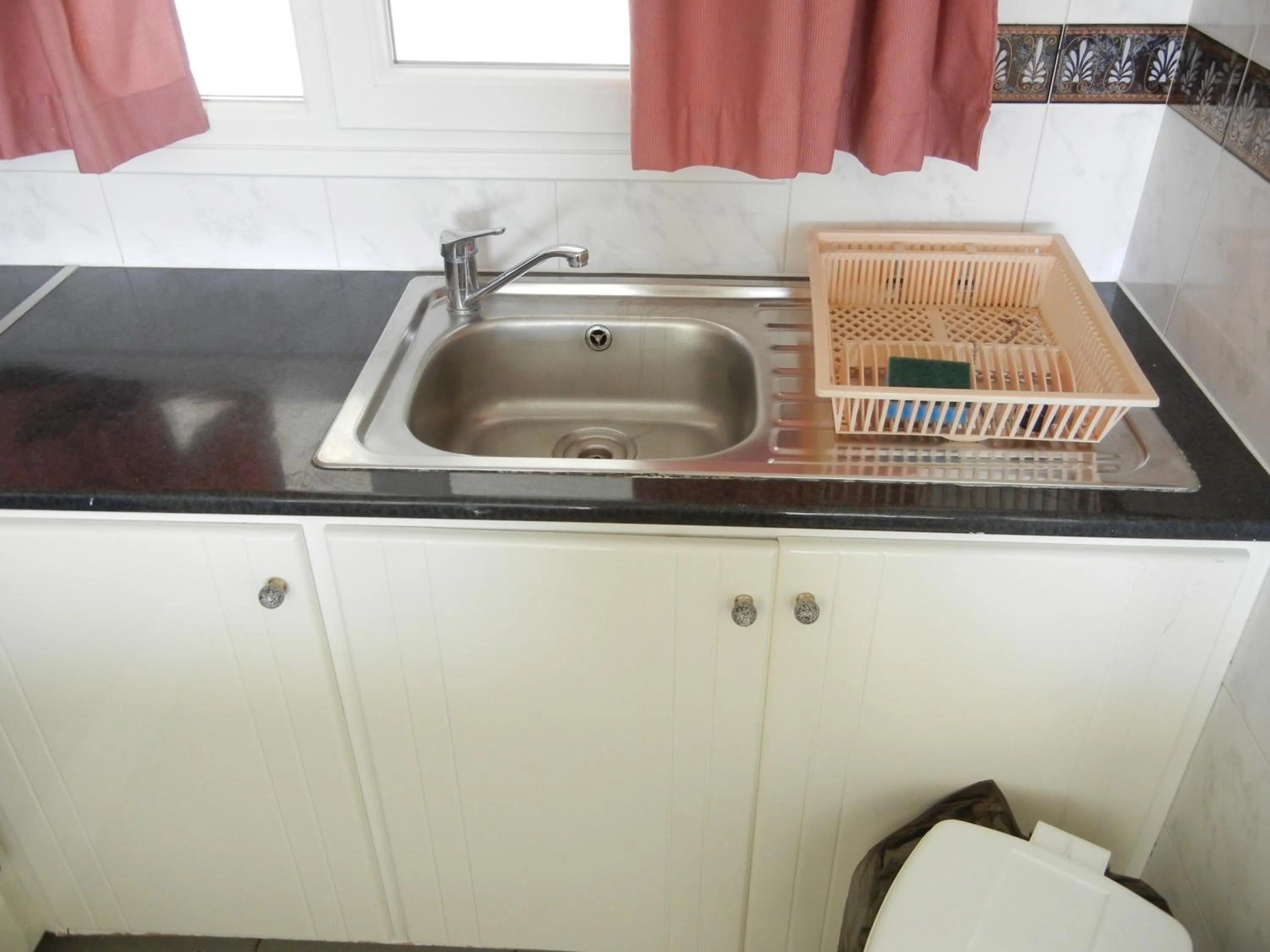 Kitchen or kitchenette in Tsialis Hotel Apartments