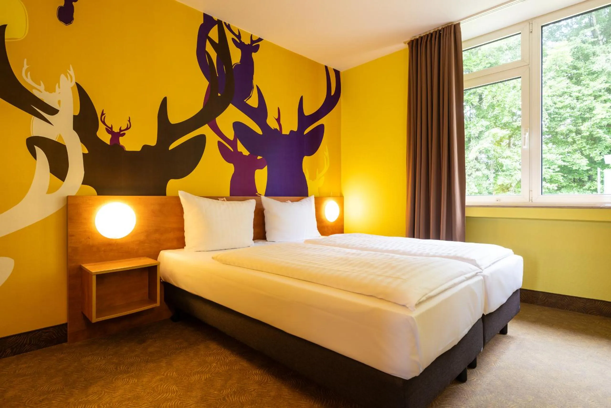 Photo of the whole room, Bed in Hotel Göttingen-West