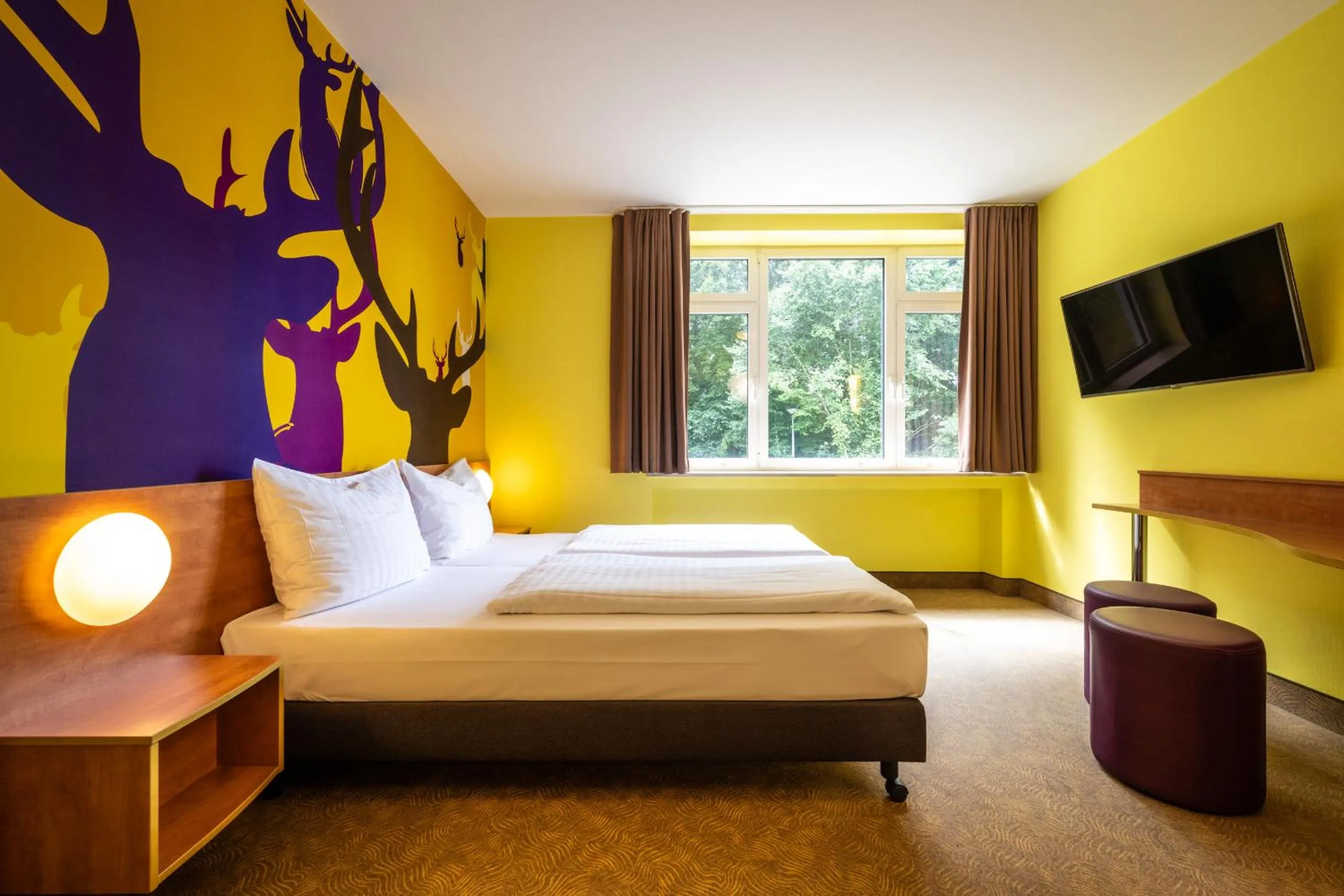 Photo of the whole room, Bed in Hotel Göttingen-West