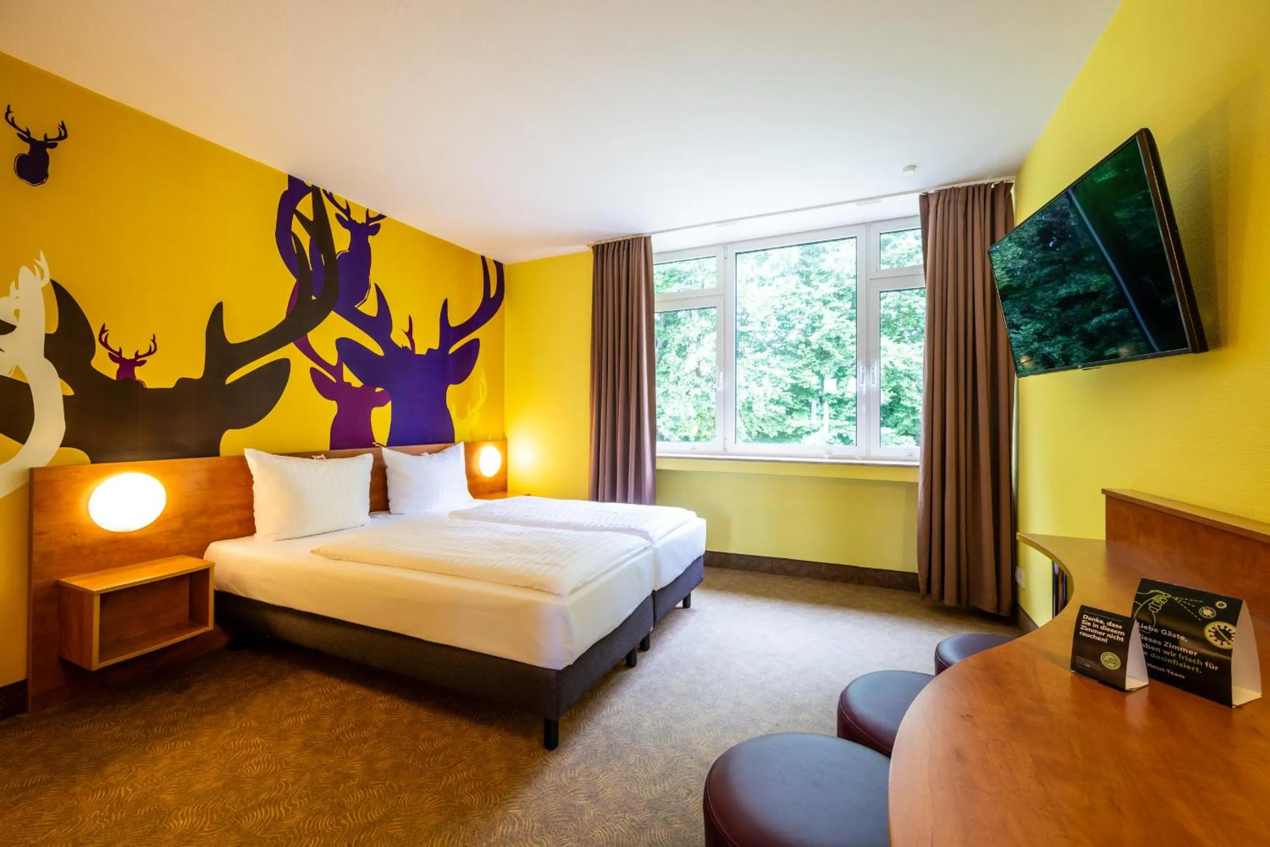 Photo of the whole room, Bed in Hotel Göttingen-West