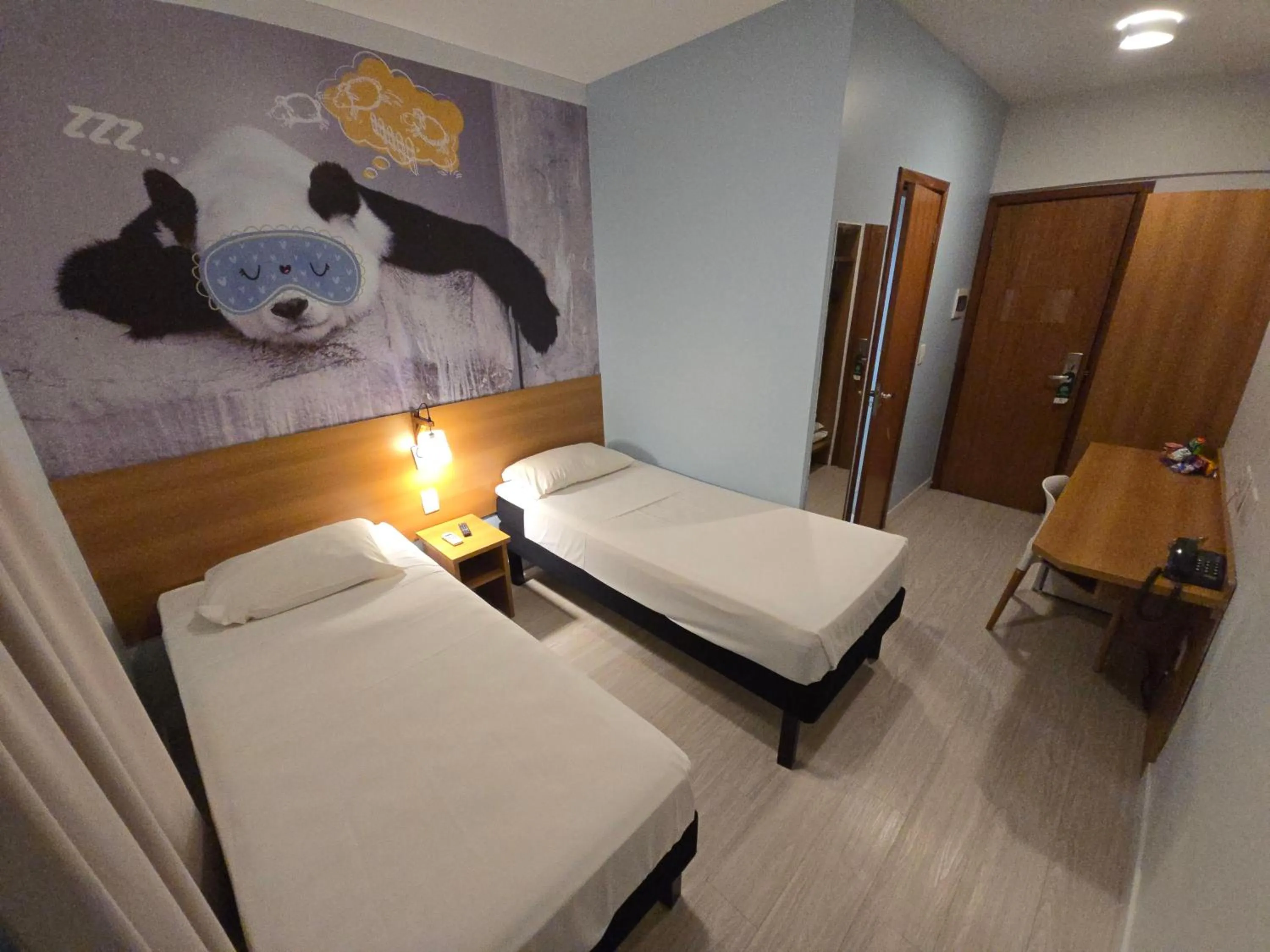 Bed in Golden Tower Maurilio Biagi by Fênix Hotéis