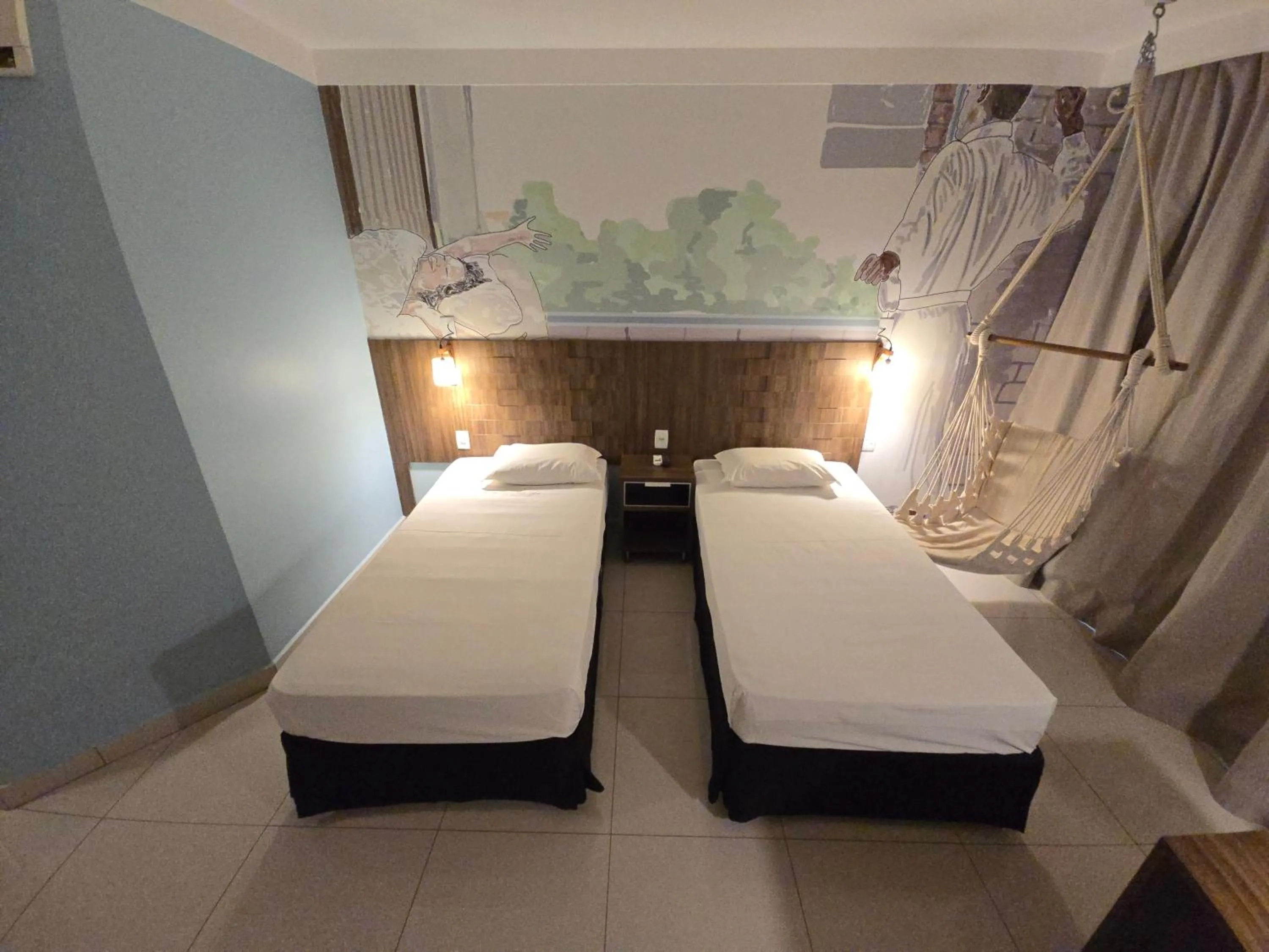 Bed in Golden Tower Maurilio Biagi by Fênix Hotéis