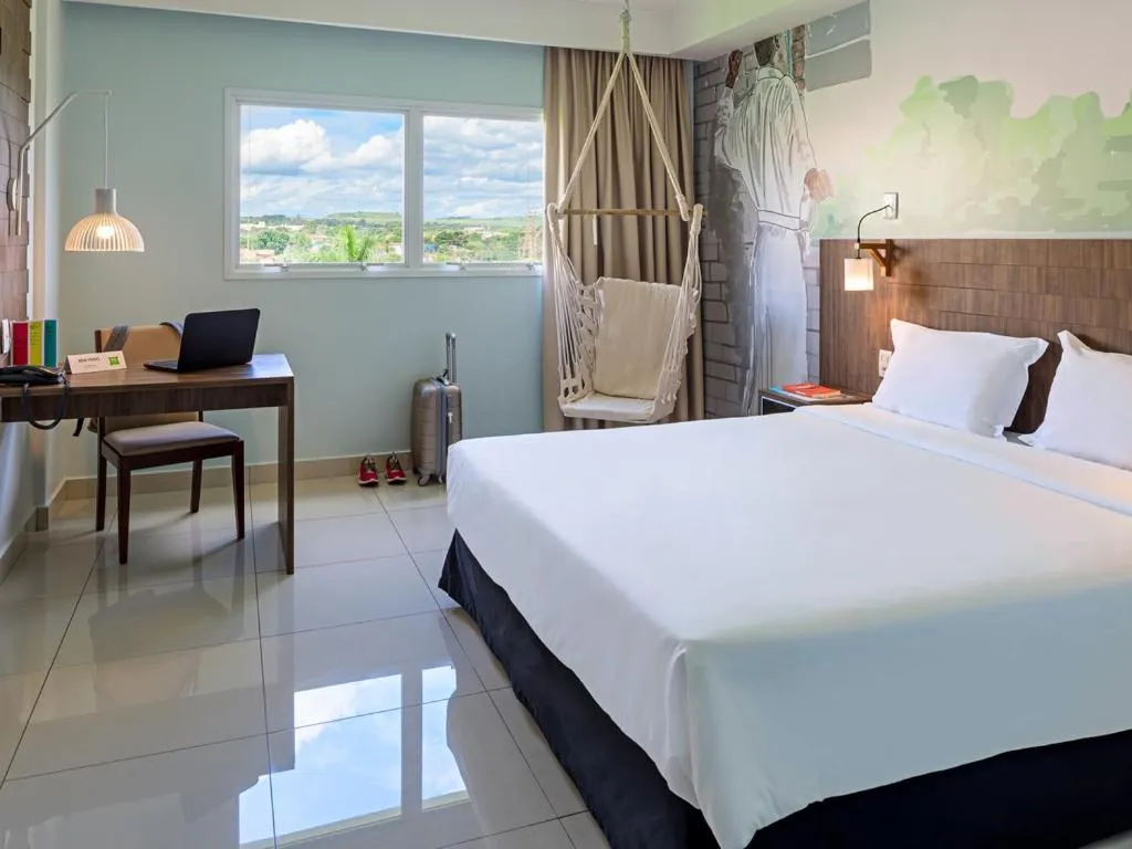 Bed in Golden Tower Maurilio Biagi by Fênix Hotéis